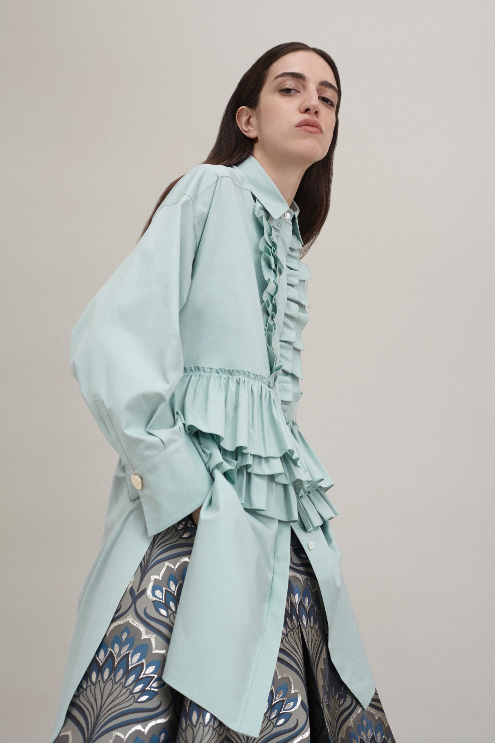blue ruffled shirt with multi skirt
