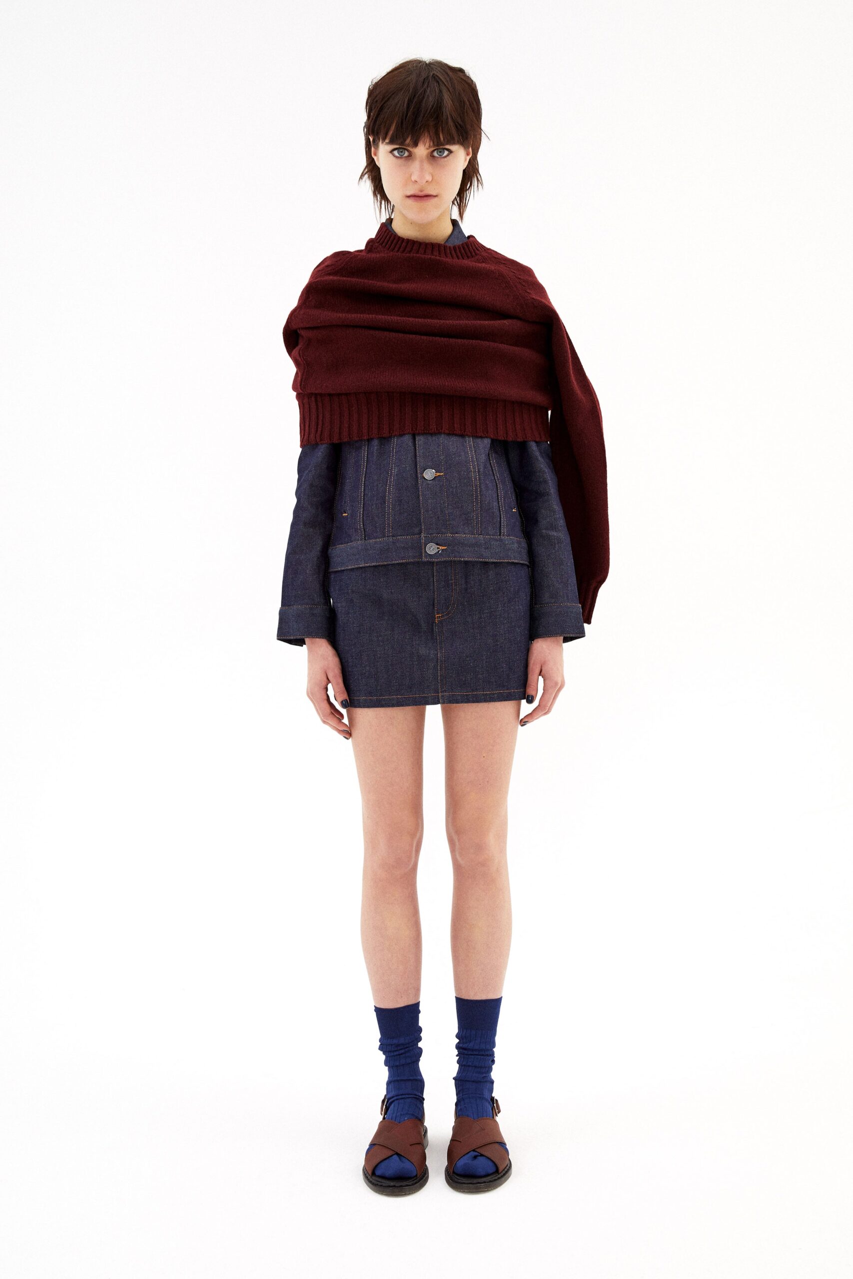 blue denim mini dress with red sweater