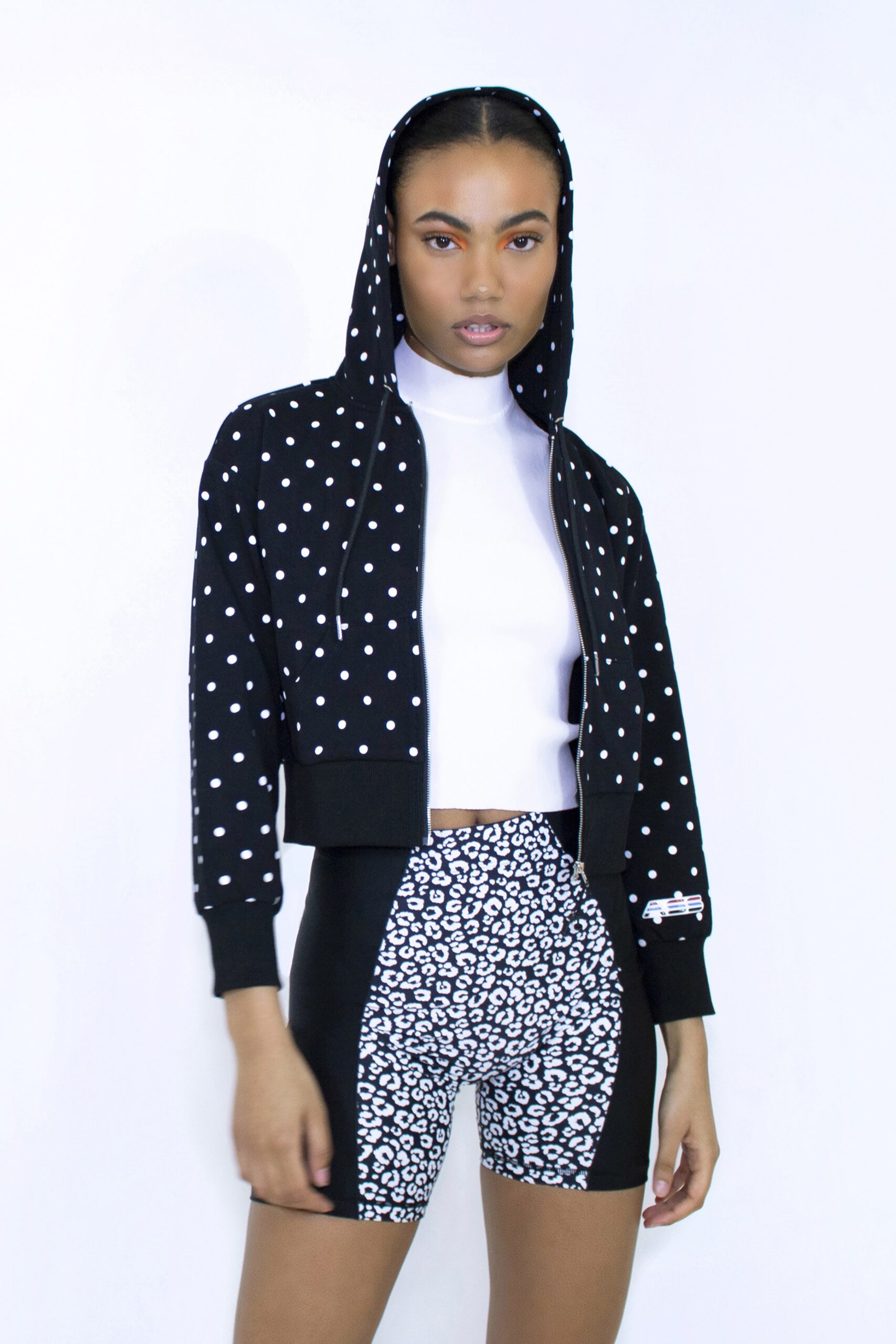 polka-dot hoodie with animal-print shorts