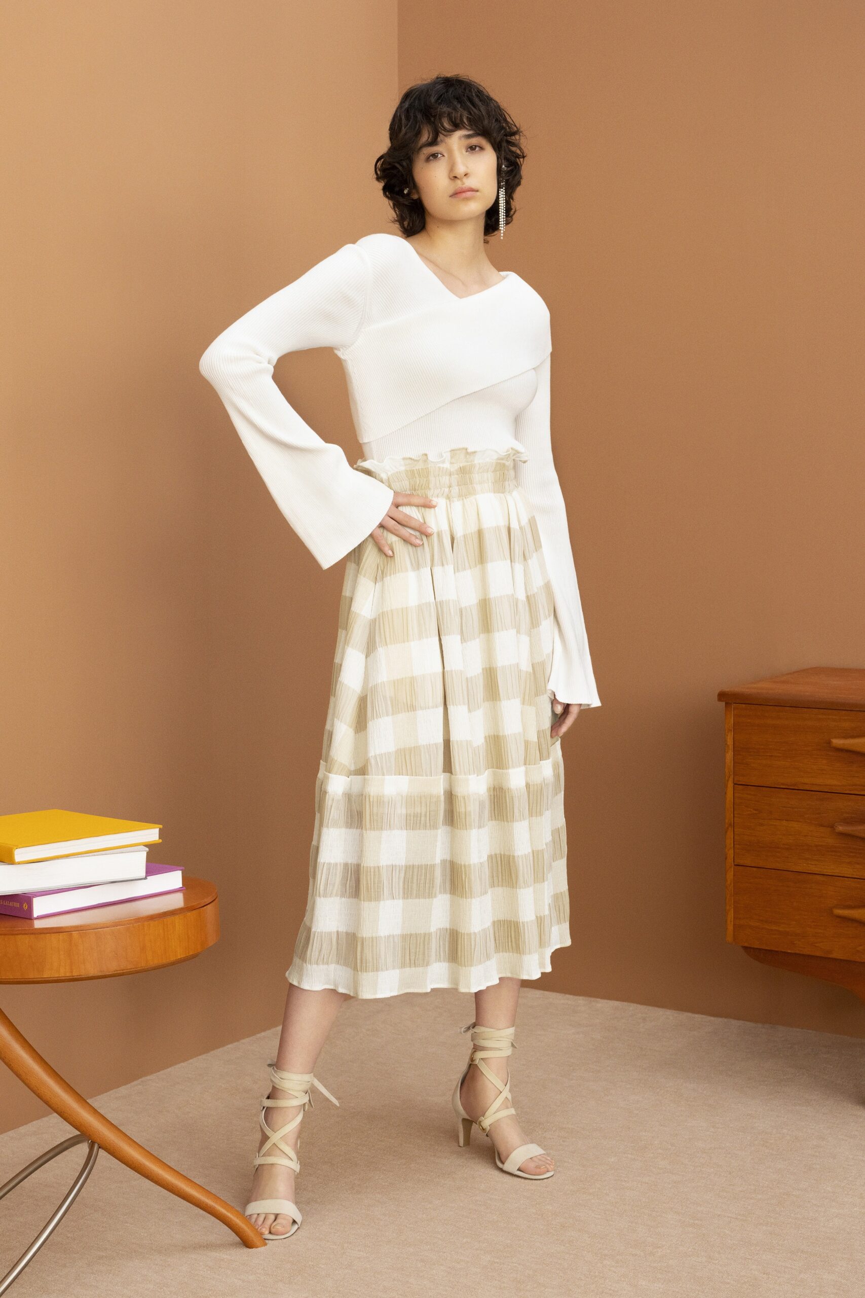 white fitted top beige pleated skirt