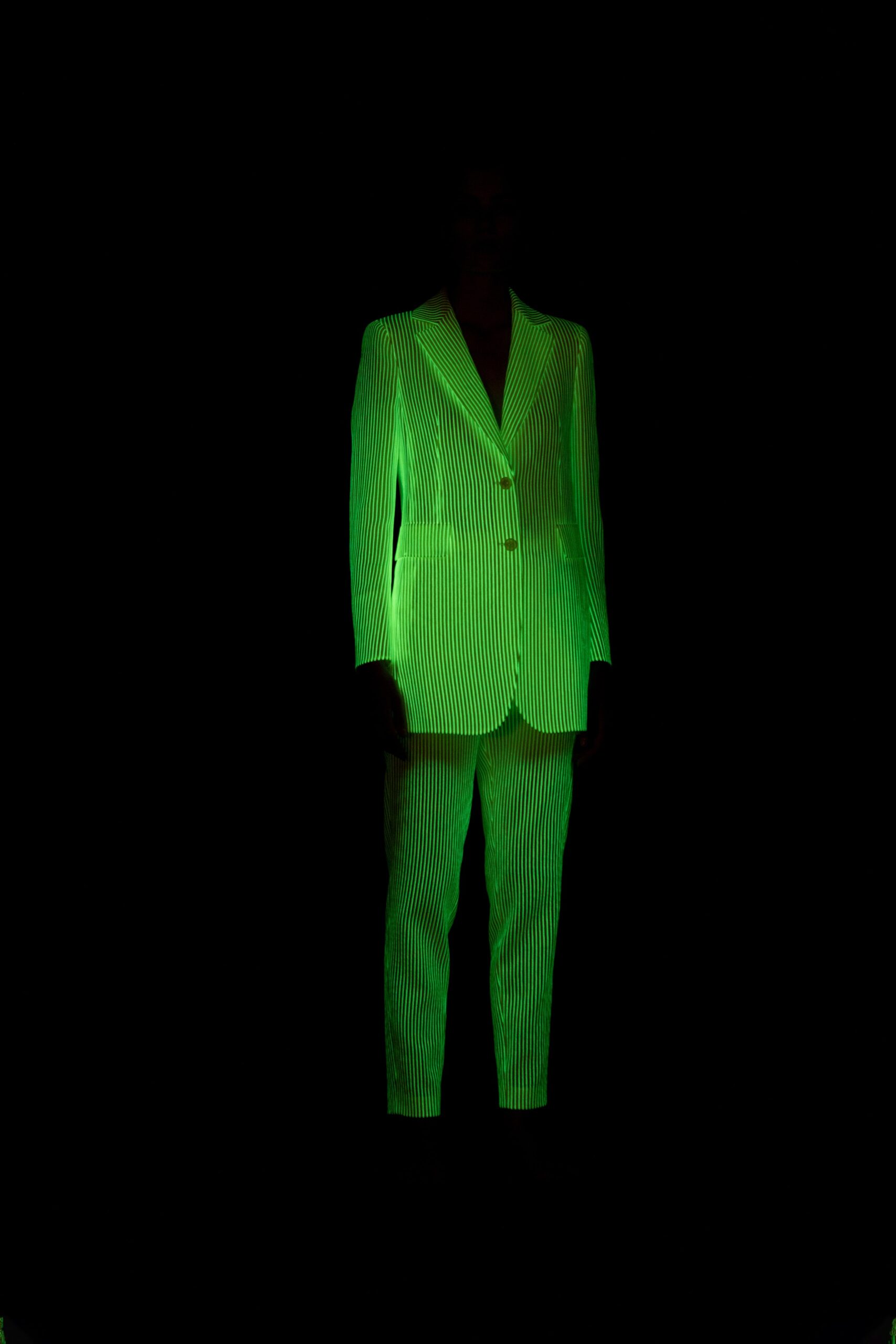 green striped tailored suit