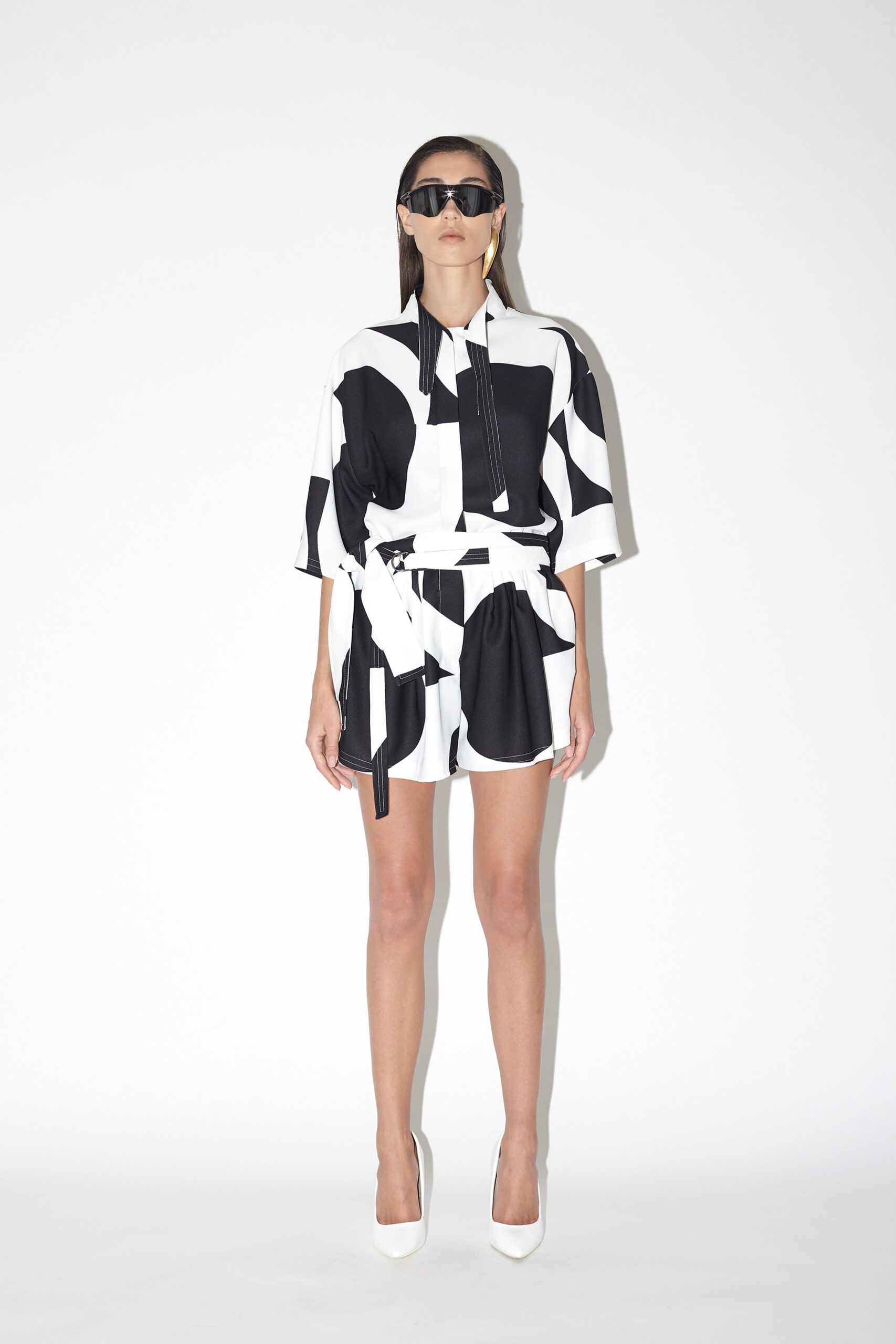 black and white printed shirt and shorts