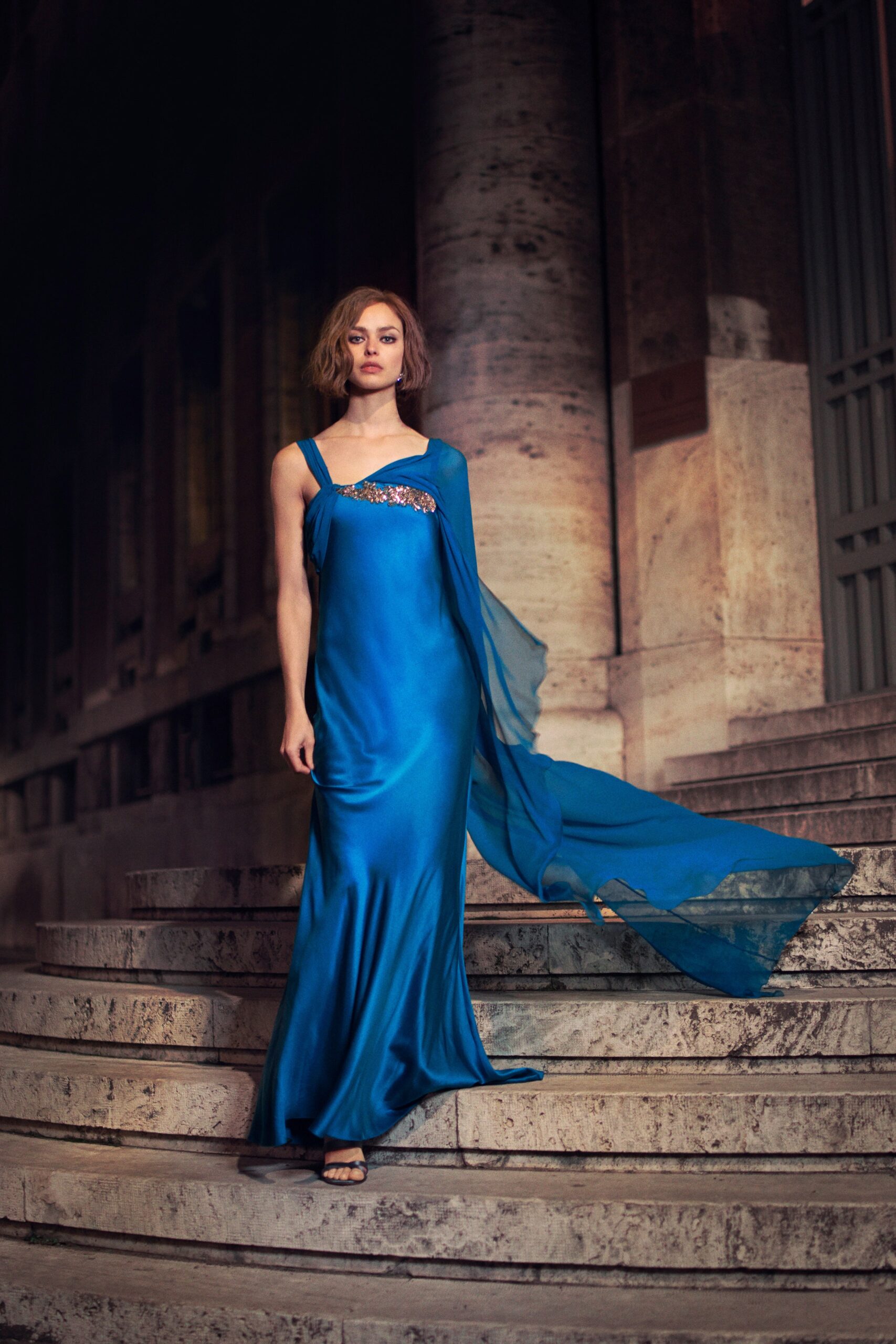 blue silk sleeveless gown