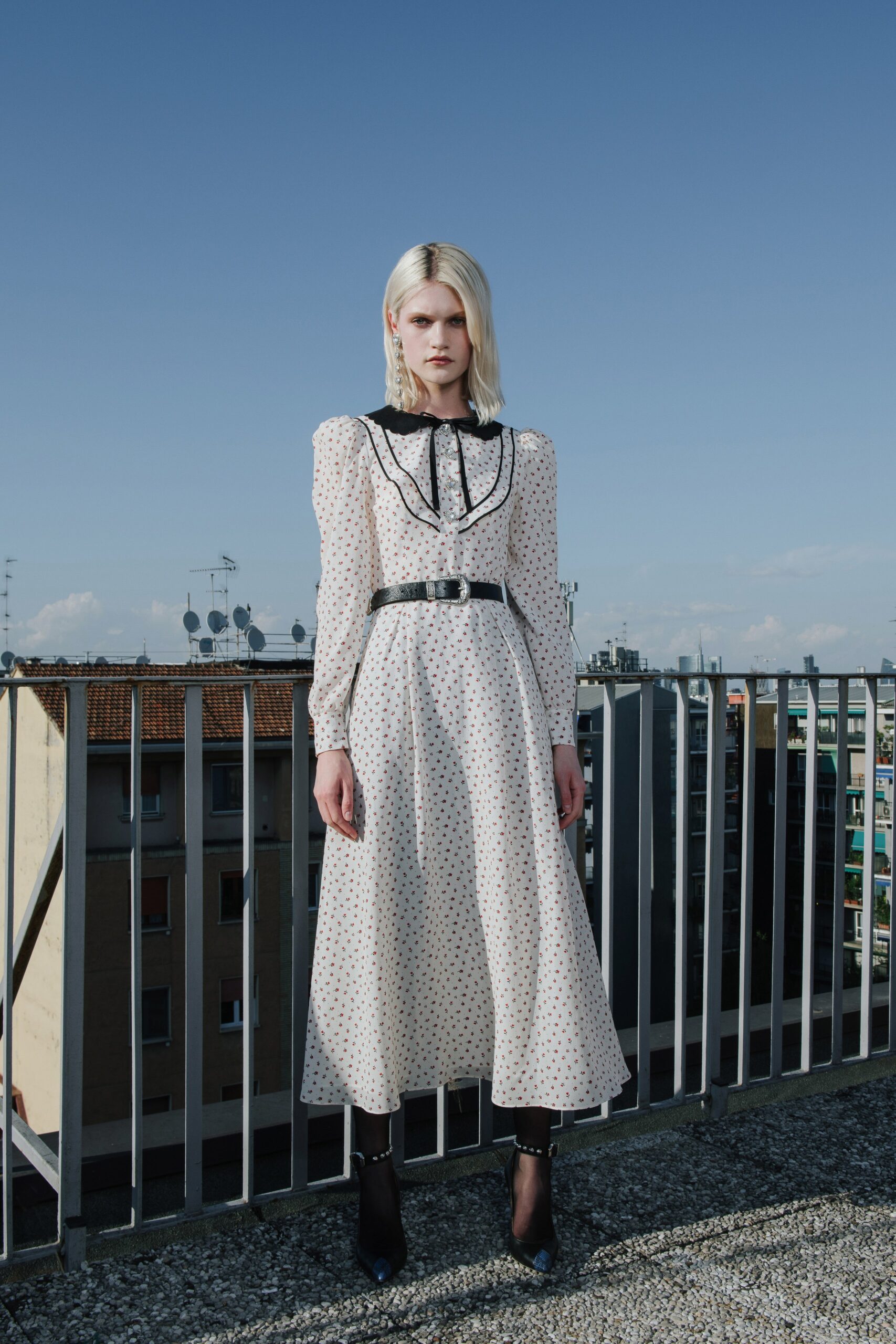 white polka-dot midi dress