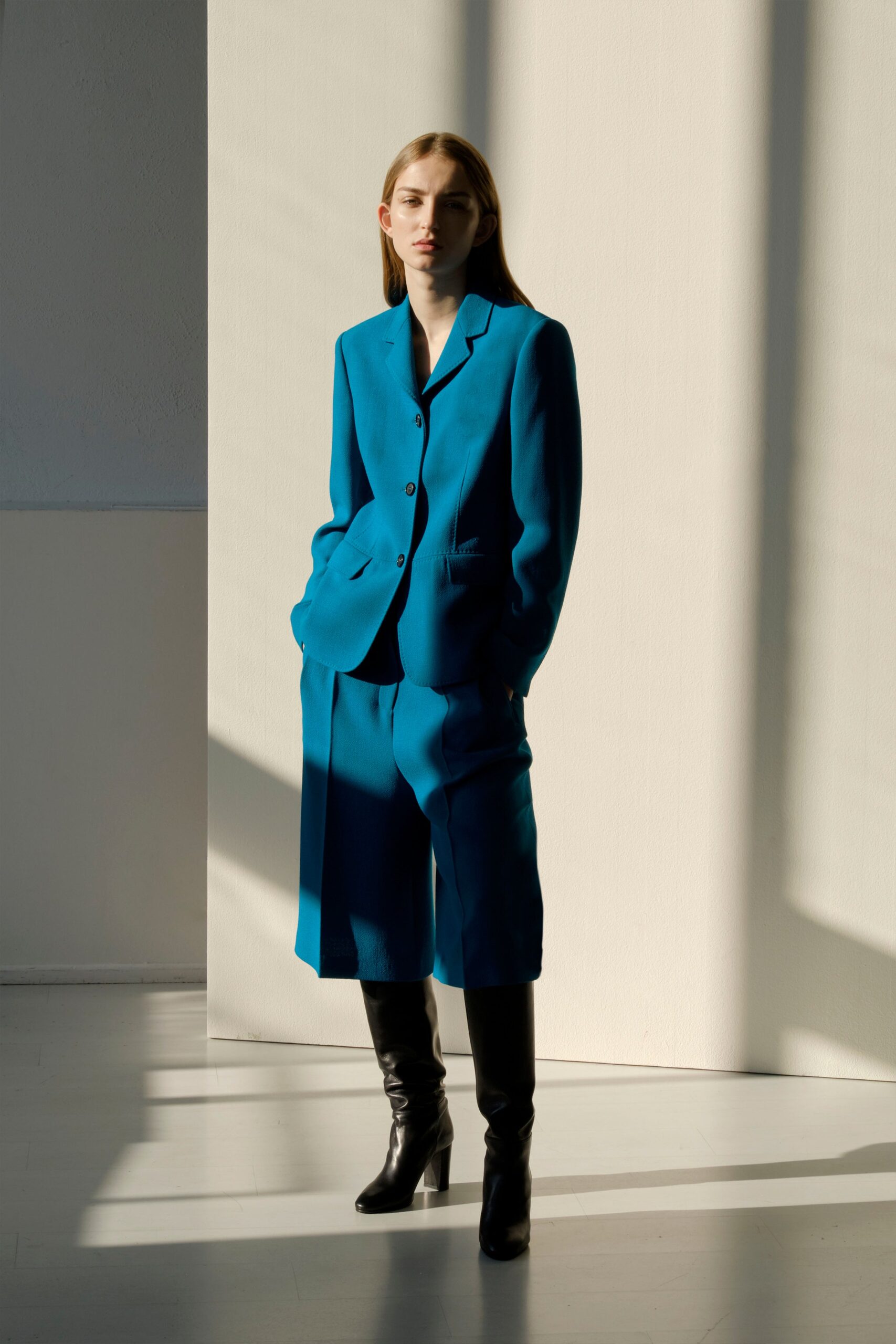 blue tailored suit with relaxed shorts