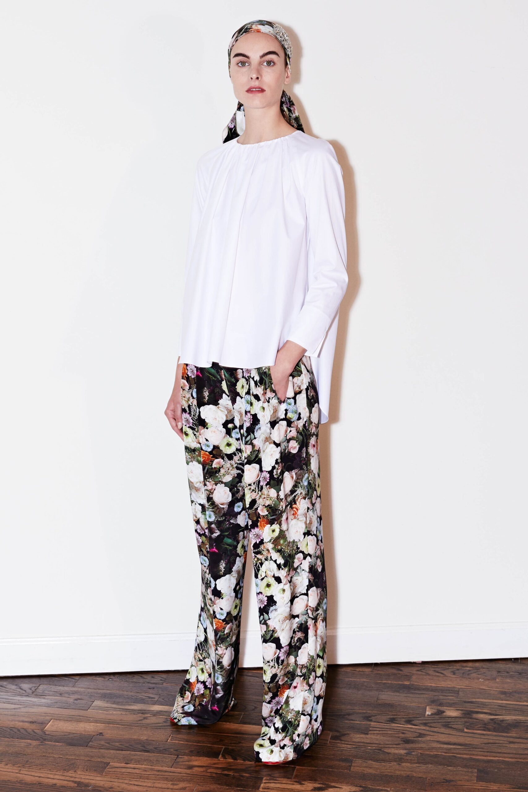 white relaxed top with floral pants