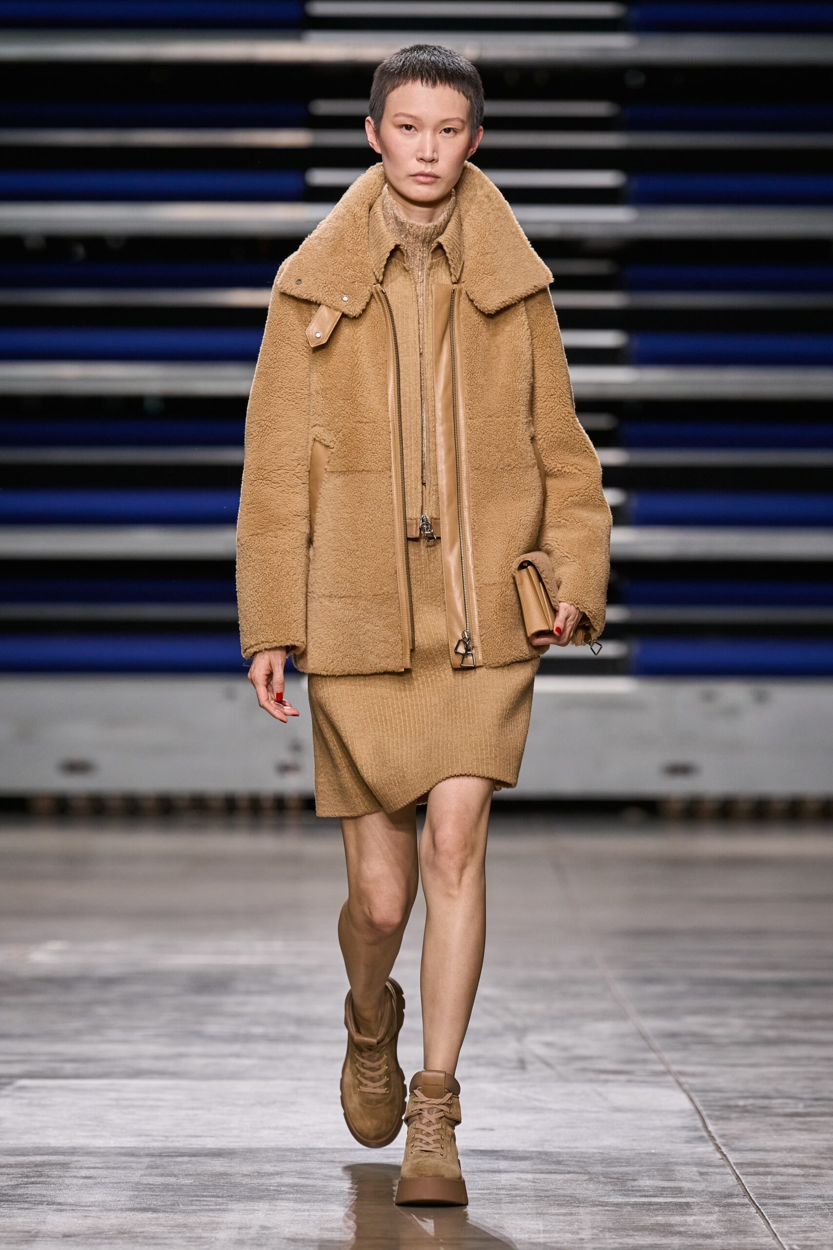 beige faux-fur coat and knit dress