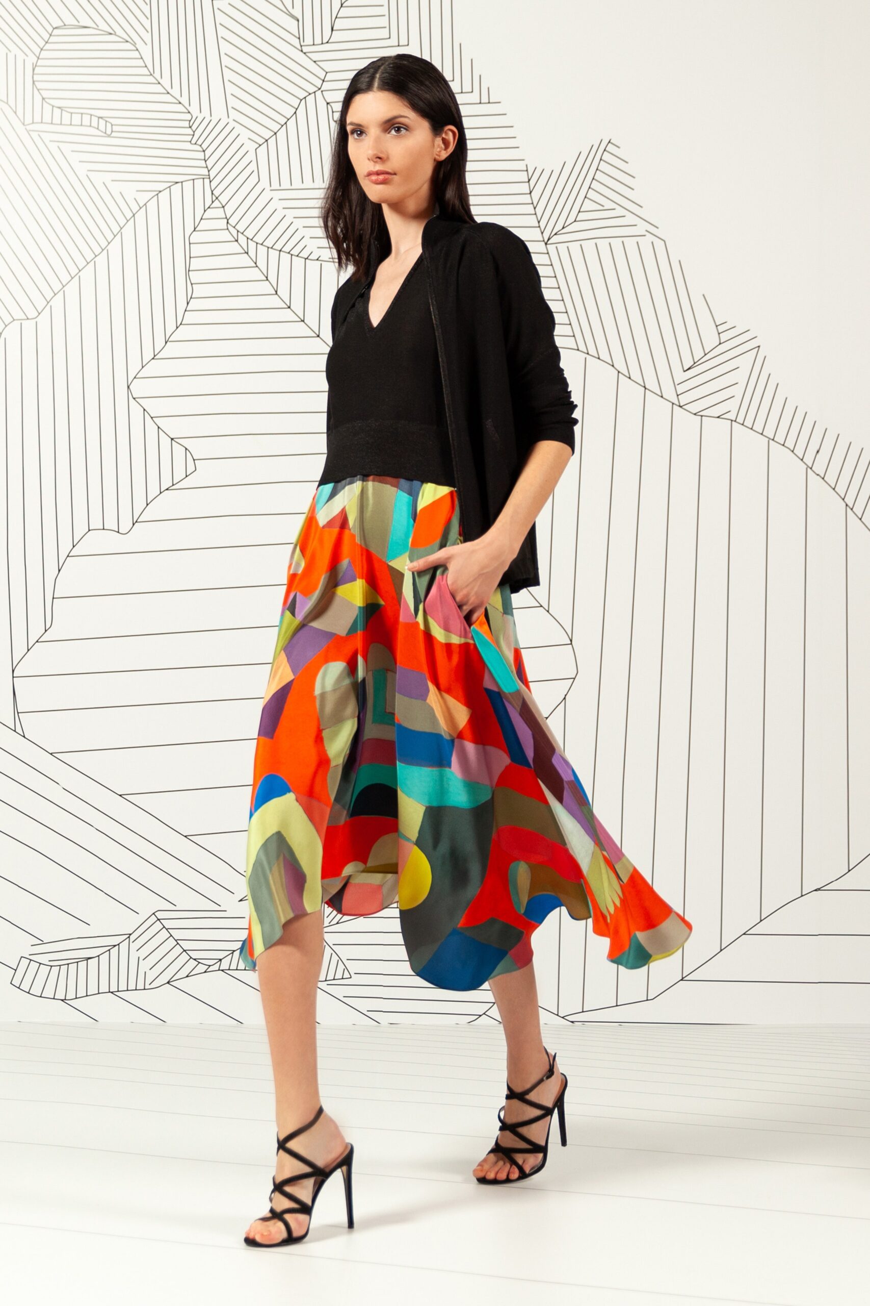 black fitted top with multi skirt