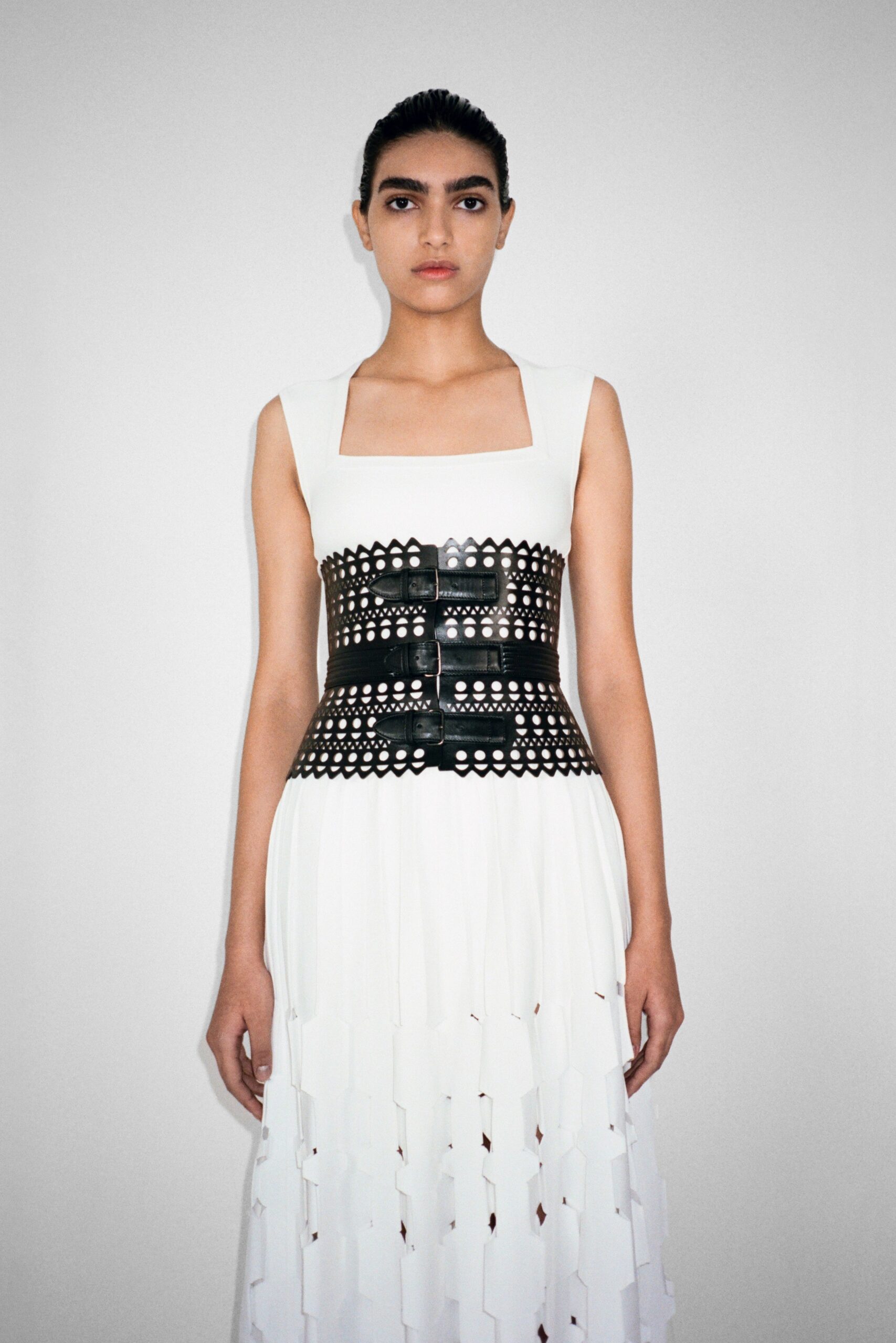 white pleated midi dress with black corset