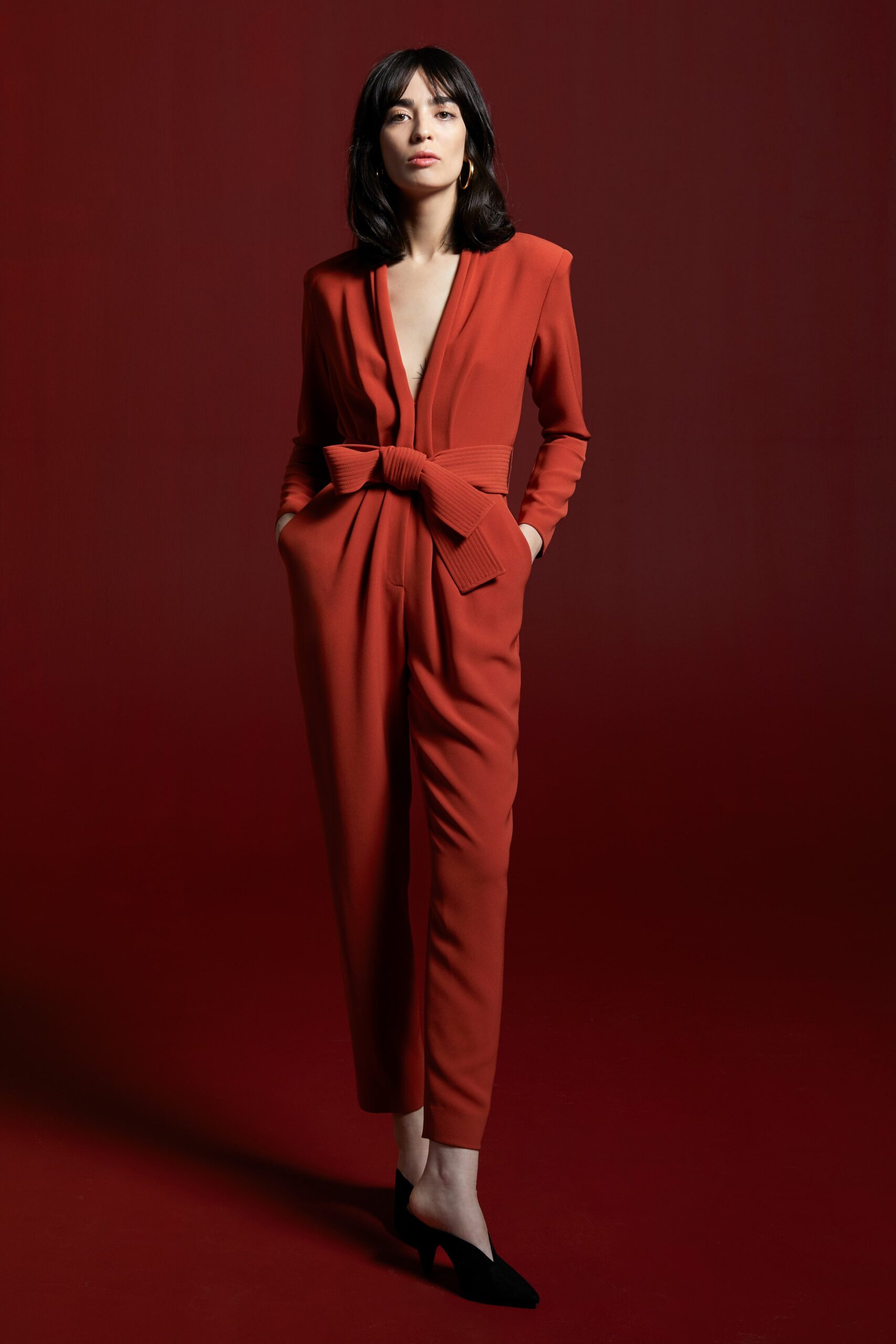 red fitted jumpsuit with belt