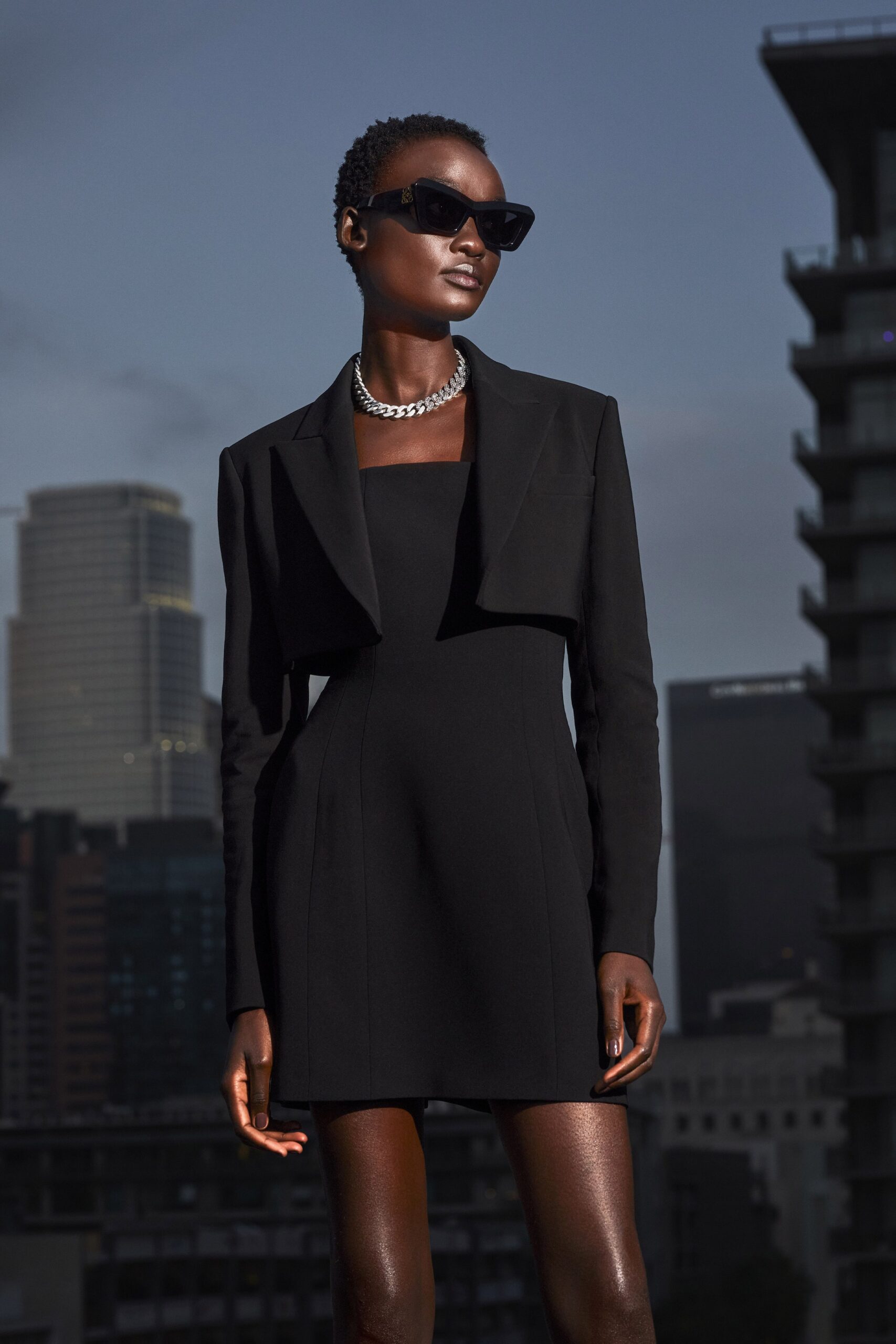 black fitted mini dress with jacket
