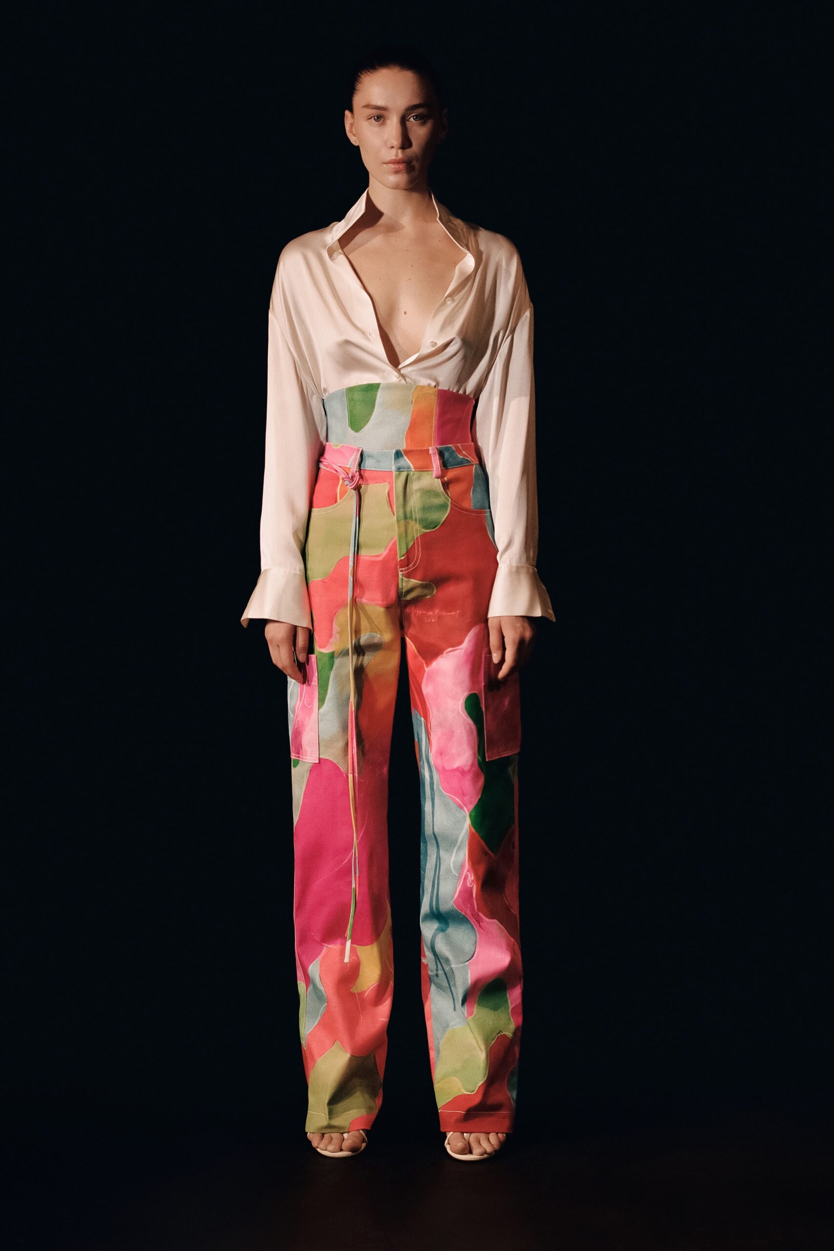 white silk shirt and multi cargo pants