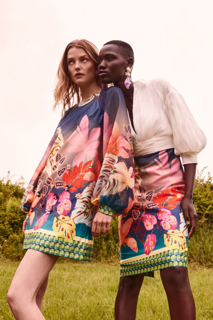 A relaxed multicolor silk dress with long sleeves and a V-neckline featuring a flared silhouette.