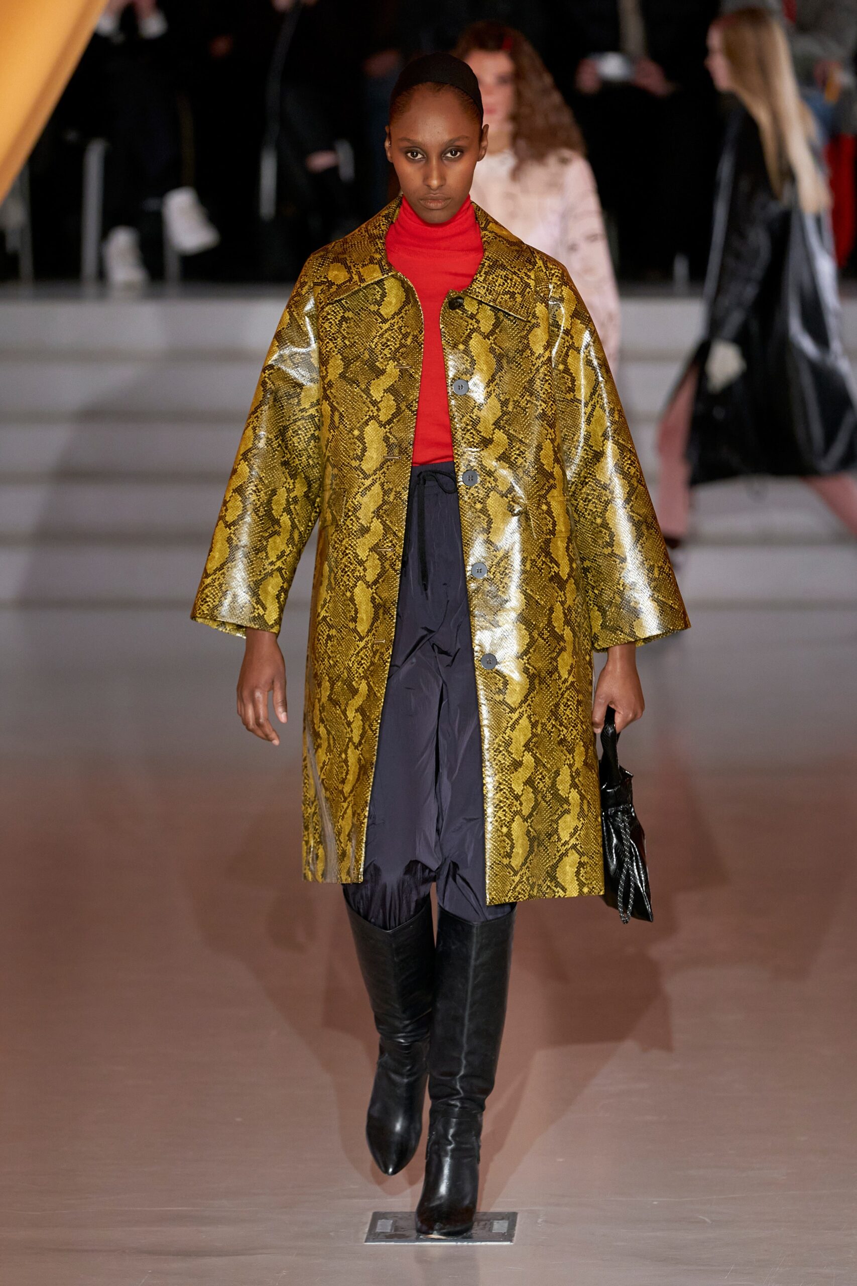 yellow printed coat with red top