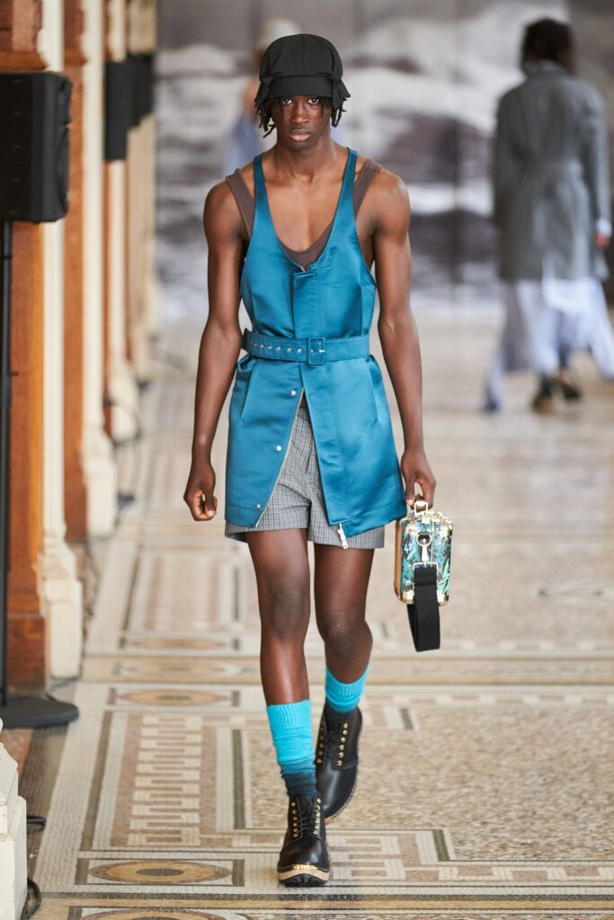 blue fitted dress with gray shorts