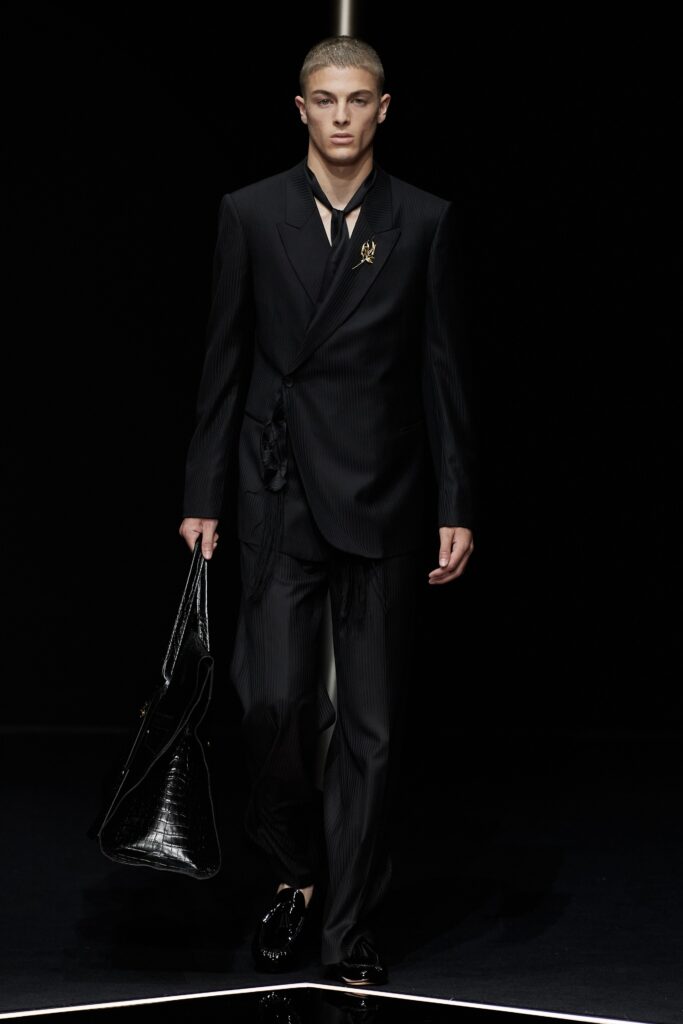 black tailored suit with bag