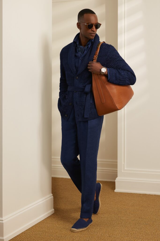 A relaxed blue cotton jacket with long sleeves and matching pants, featuring a collared design.