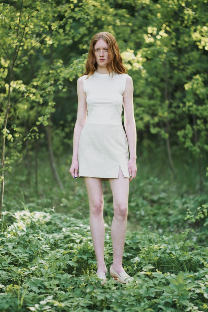 fitted white sleeveless dress