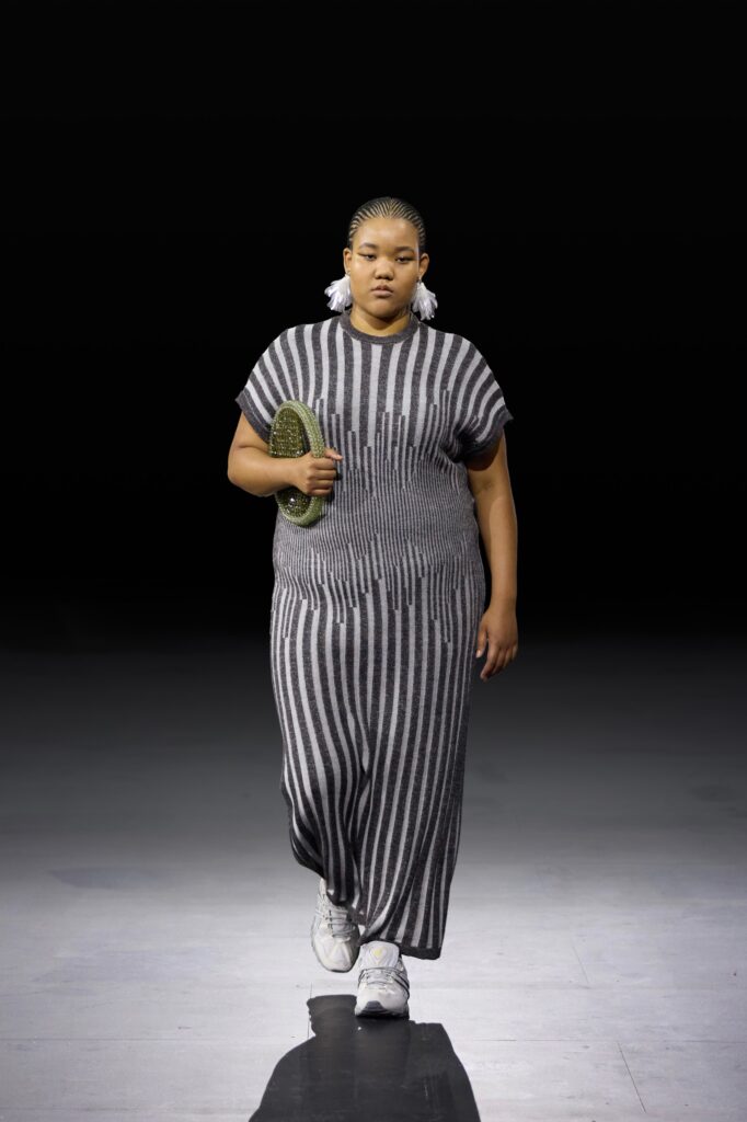 A longline striped black and white dress made from cotton, featuring a relaxed fit.