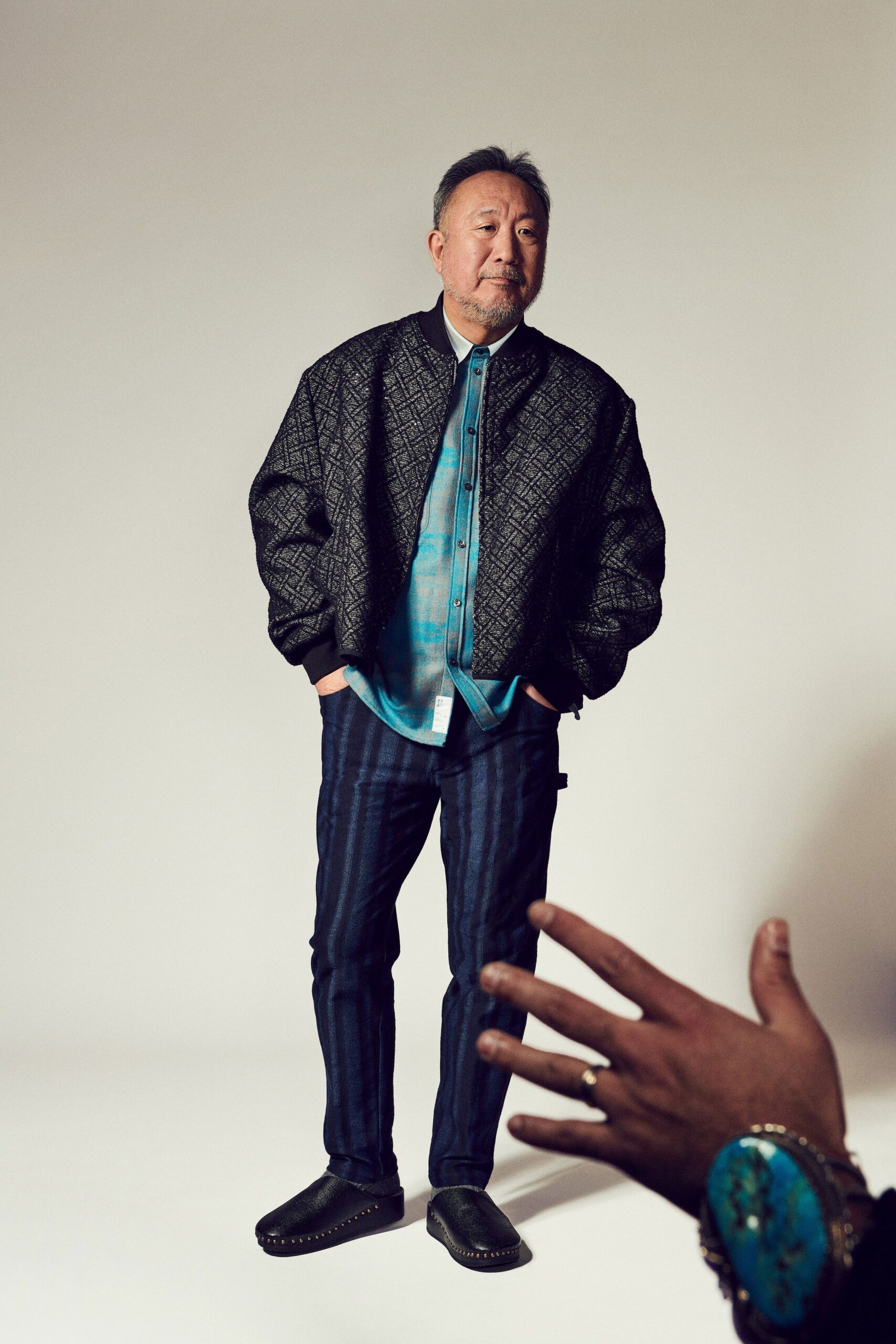 black relaxed jacket with blue shirt