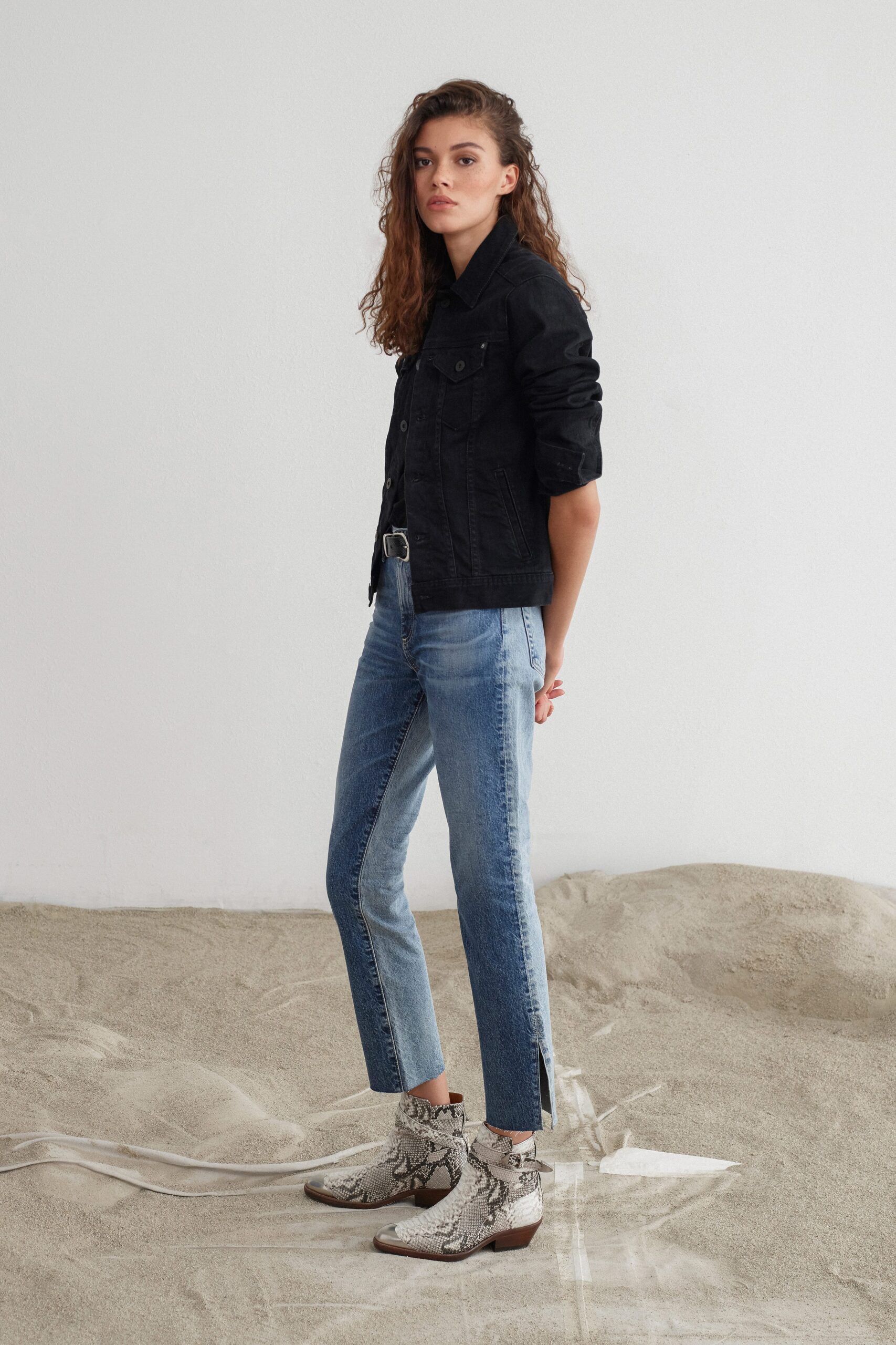 black denim jacket with blue jeans