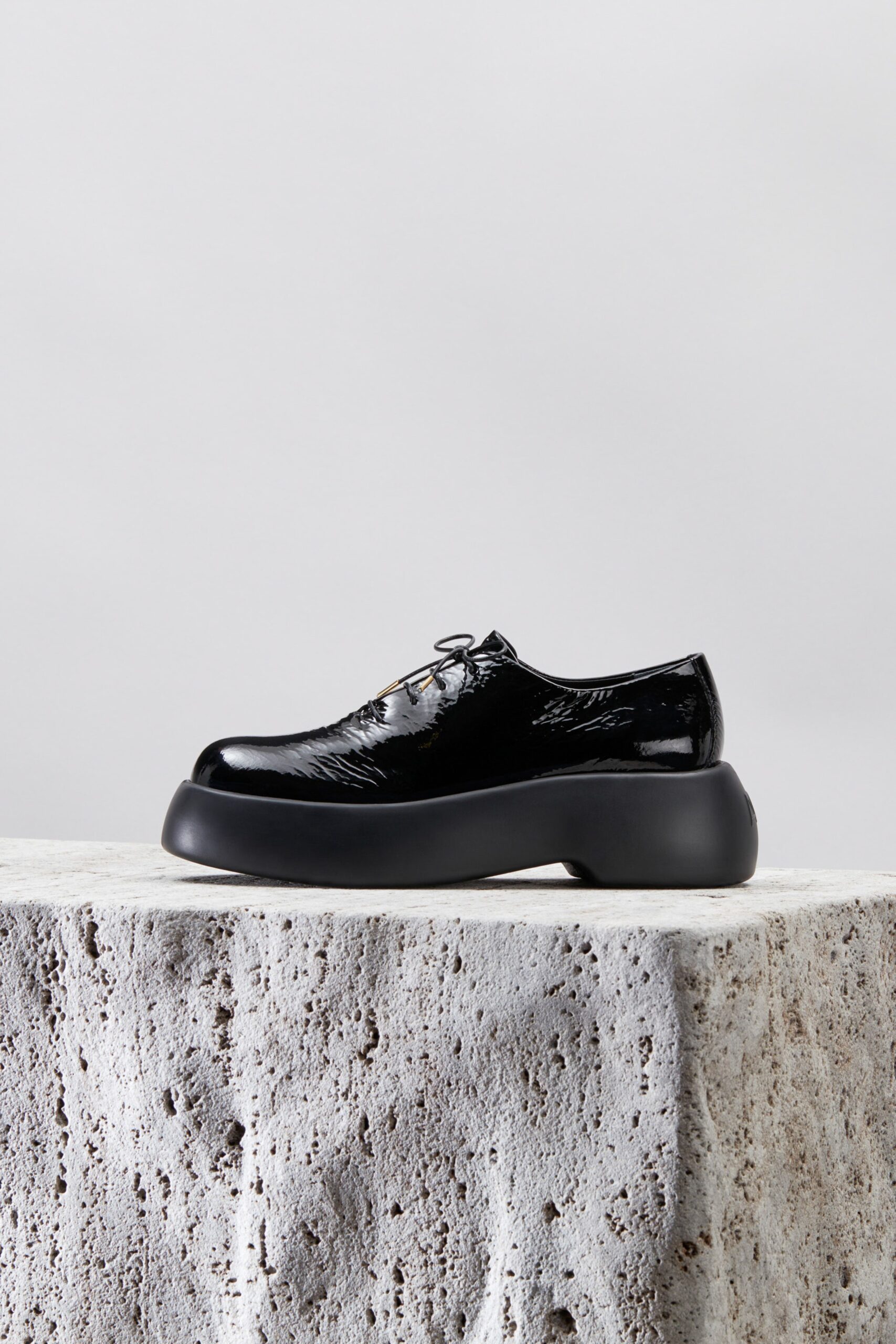 black glossy leather shoes