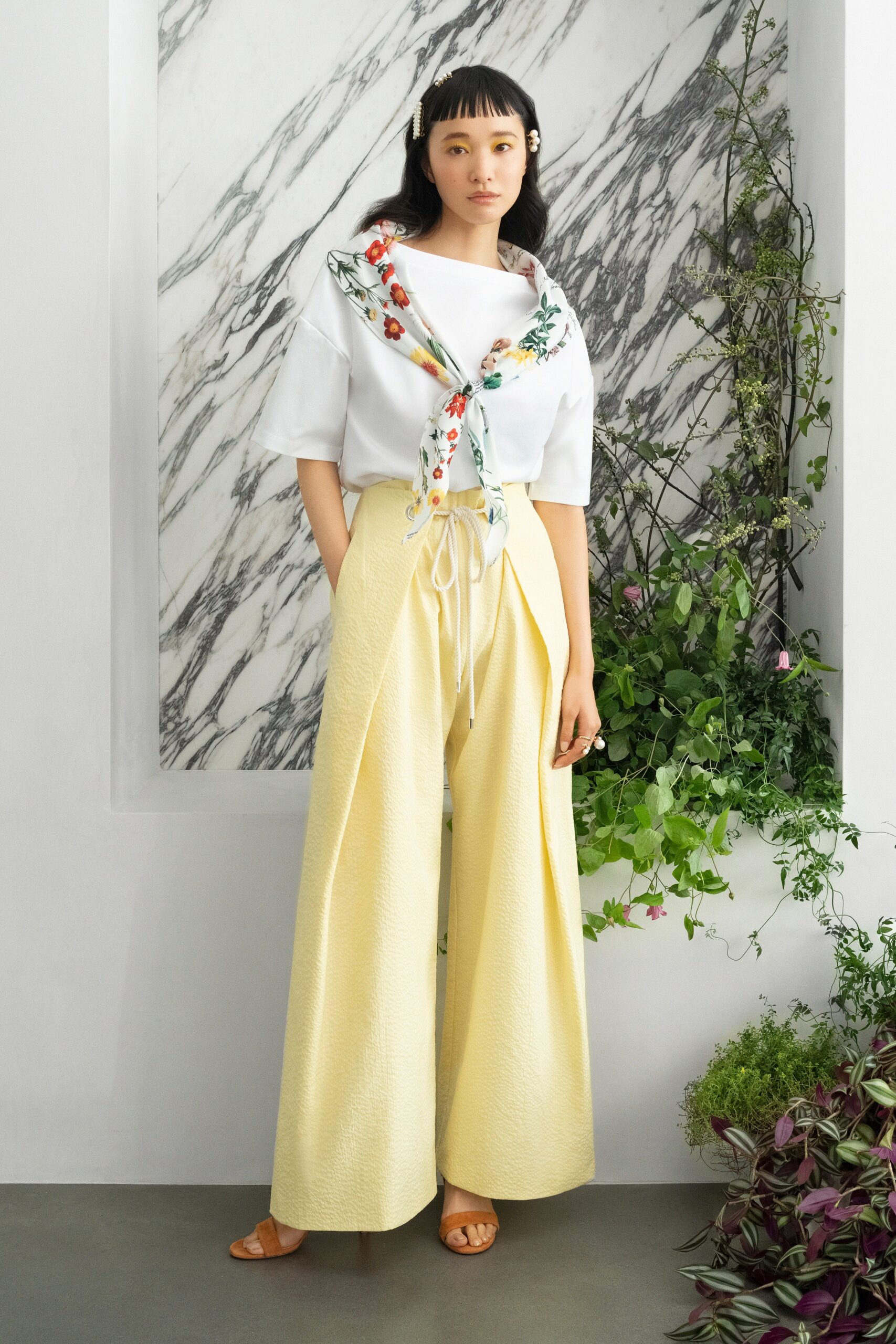white relaxed top with yellow pants