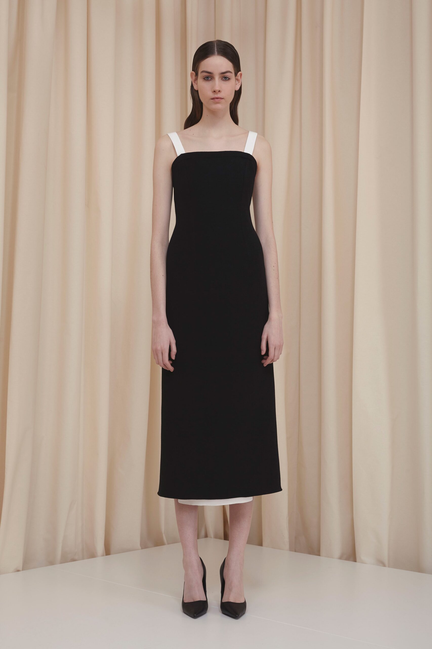 black fitted midi dress