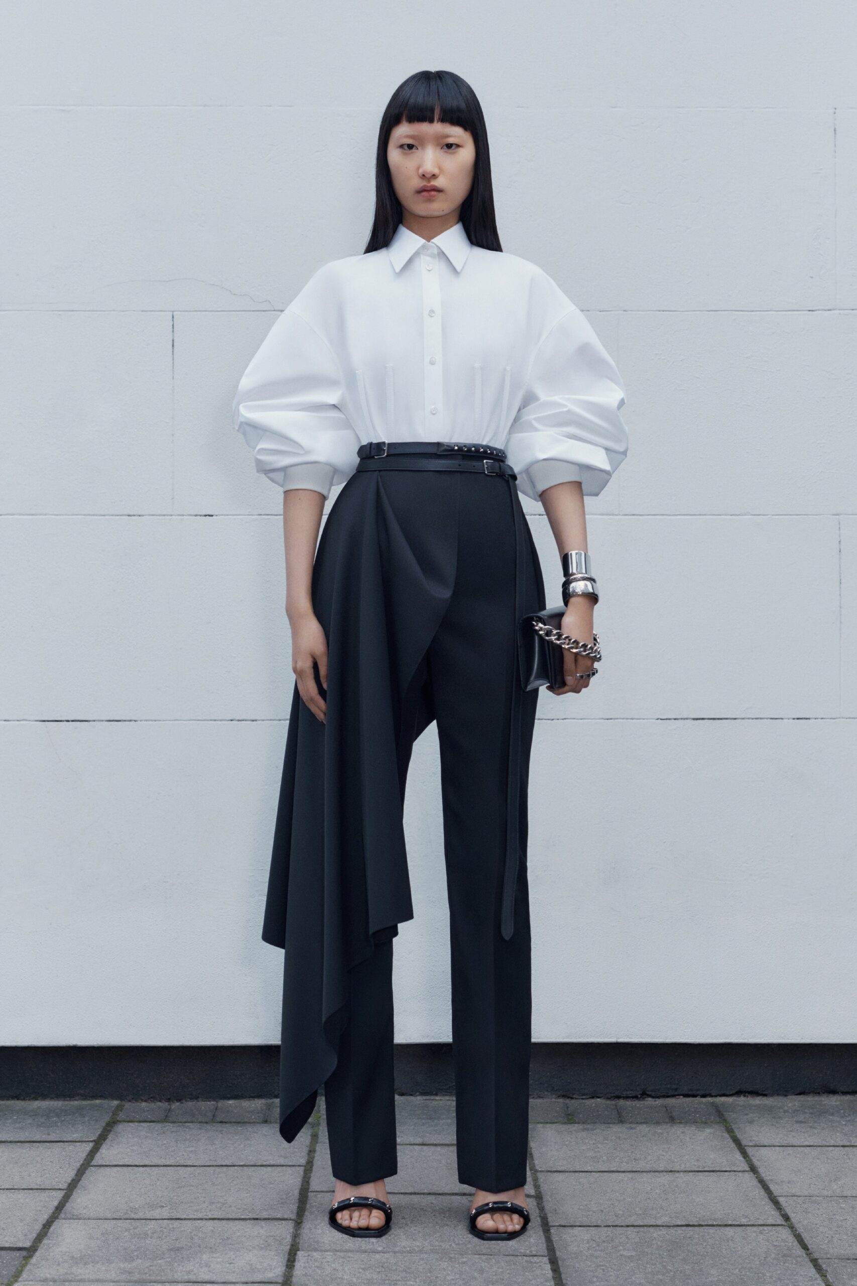 white fitted shirt with black tailored pants