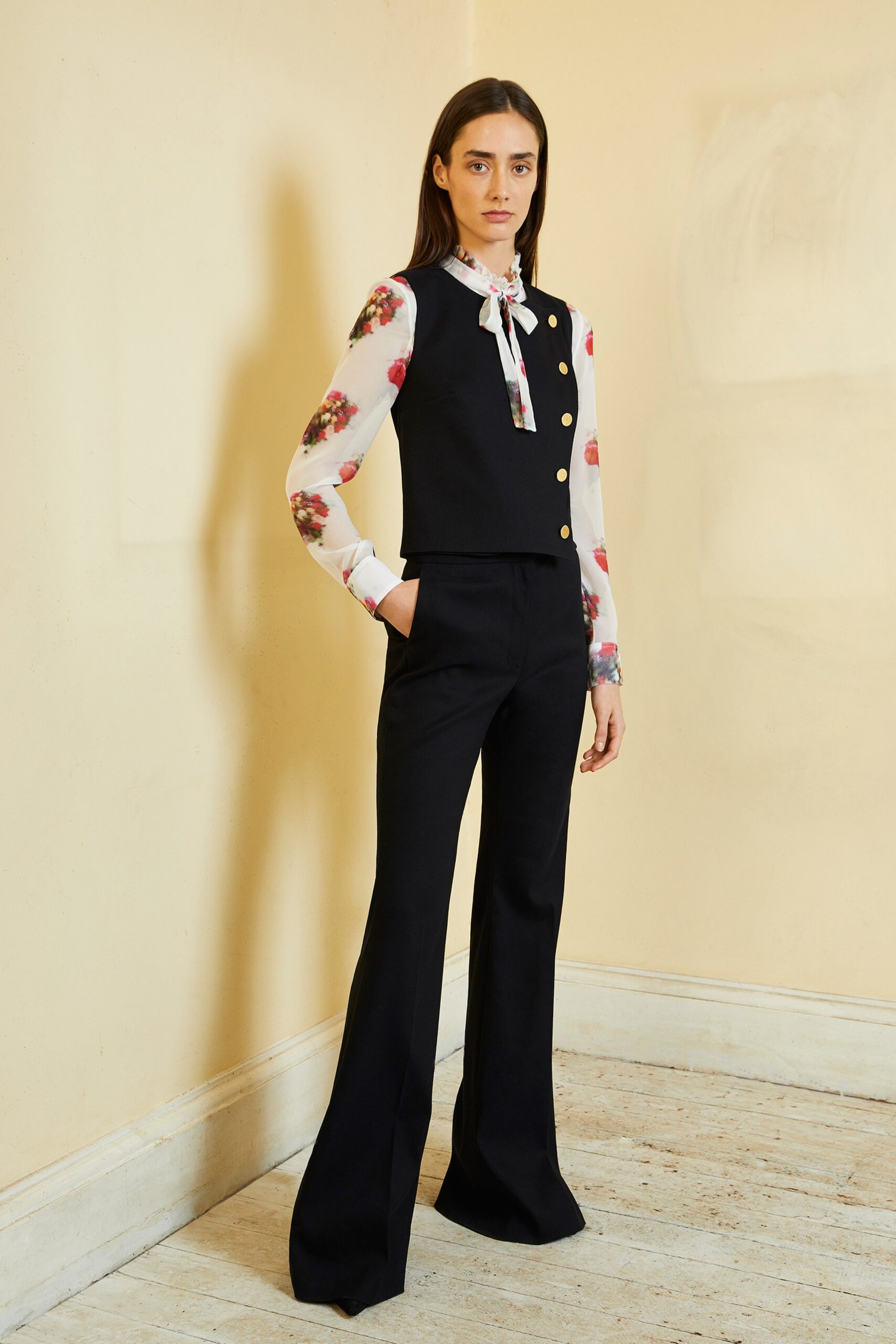 black vest white floral blouse