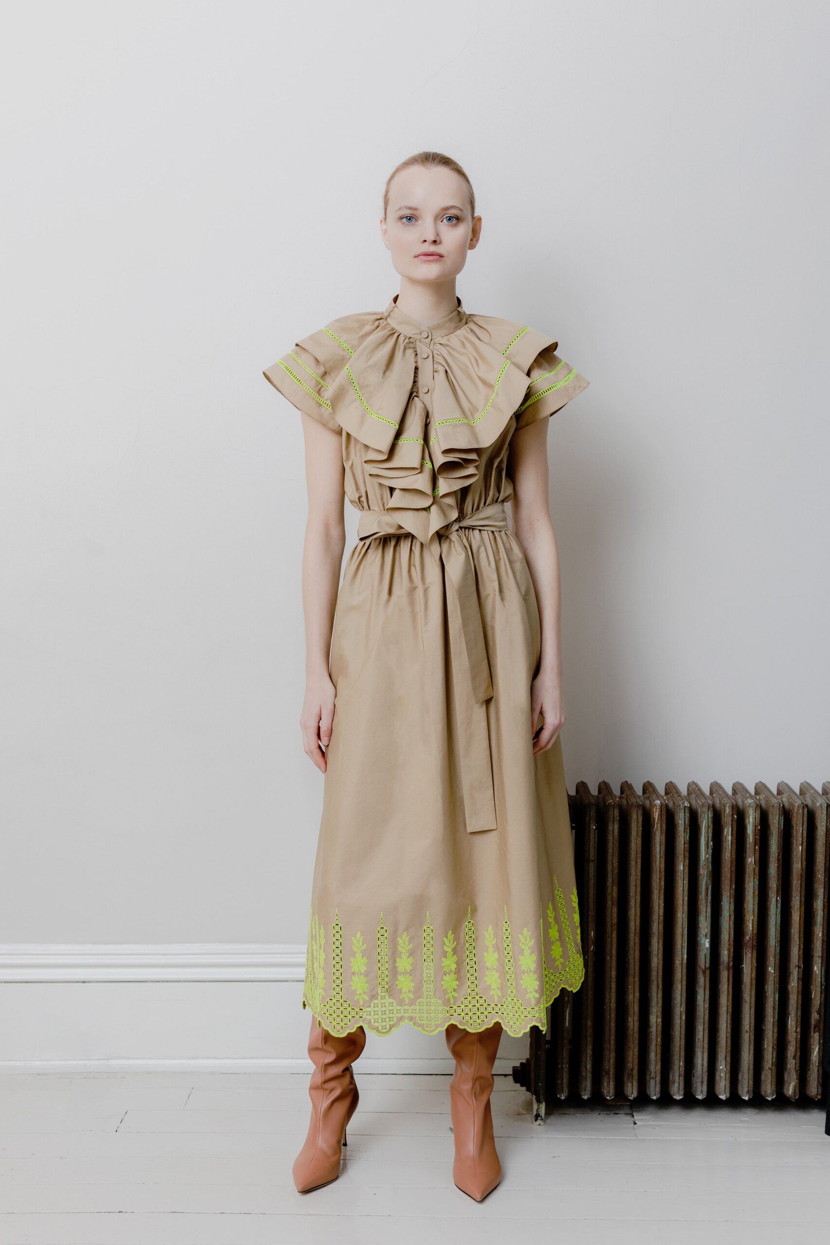 beige ruffled midi dress with pink boots
