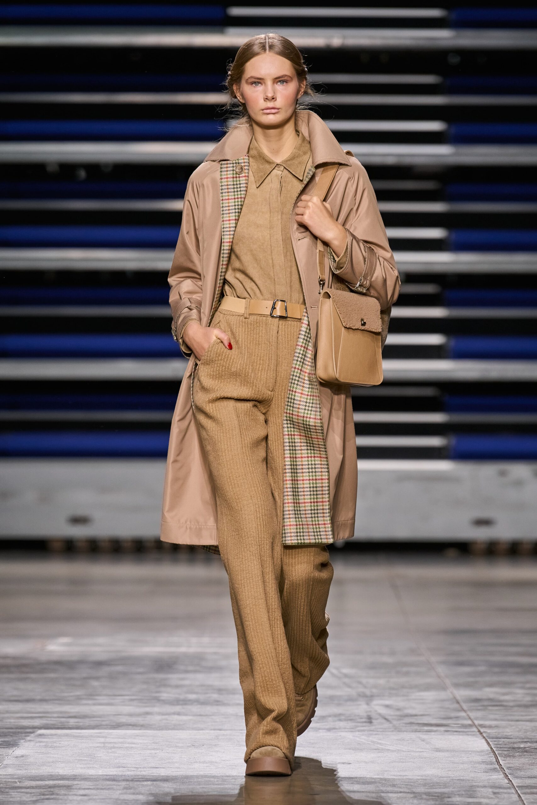 beige coat and tailored pants