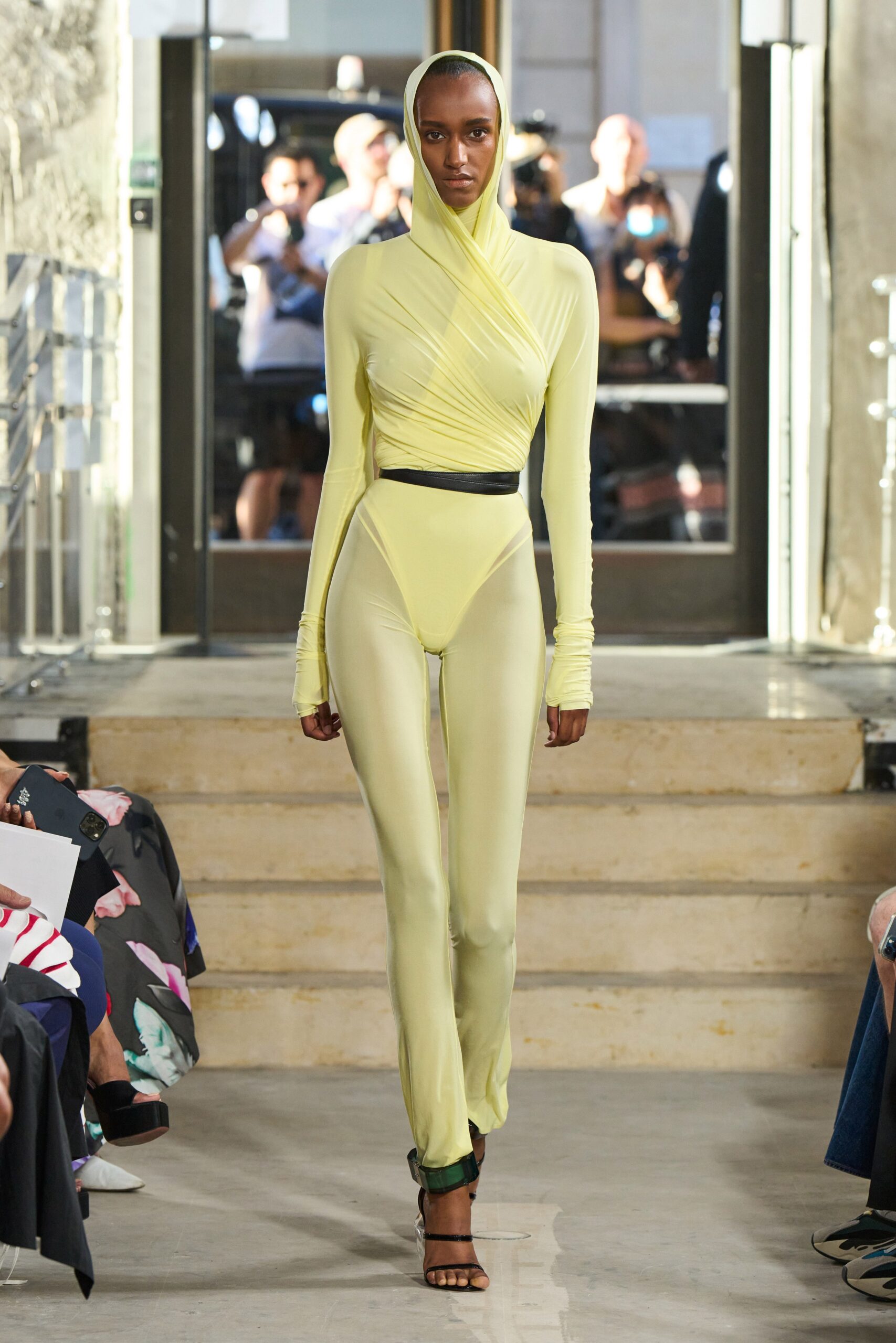 yellow fitted mesh catsuit