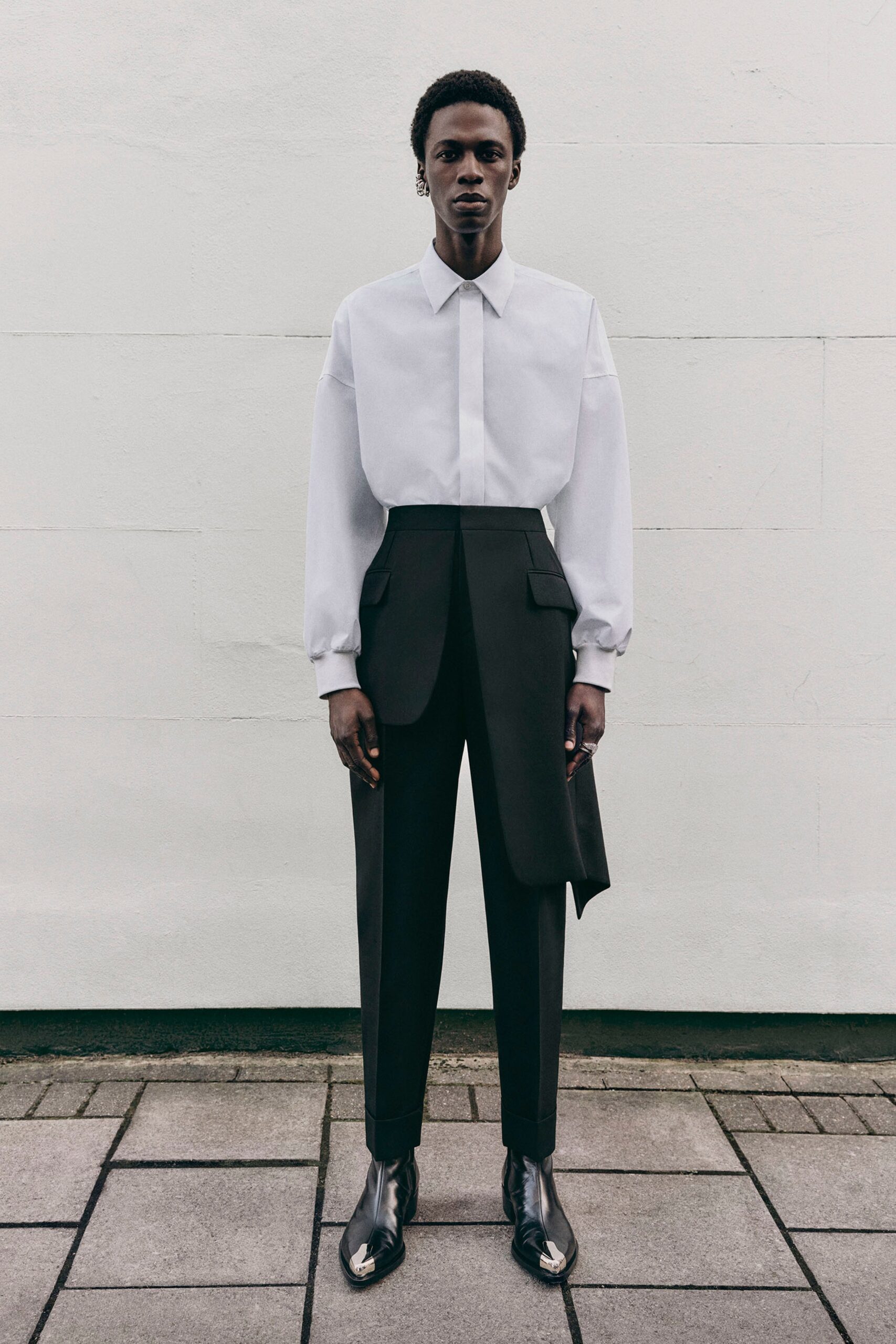 white fitted shirt and black tailored pants