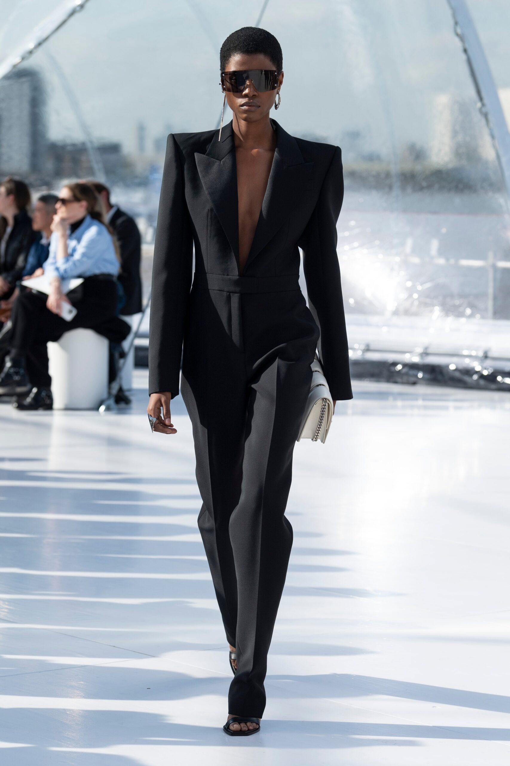 fitted black suit with v-neck