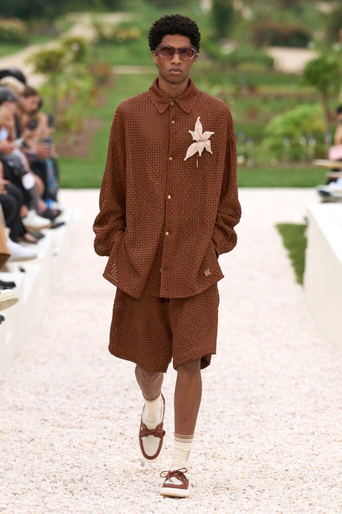 A relaxed brown cotton shirt with short sleeves and matching shorts featuring a textured design.