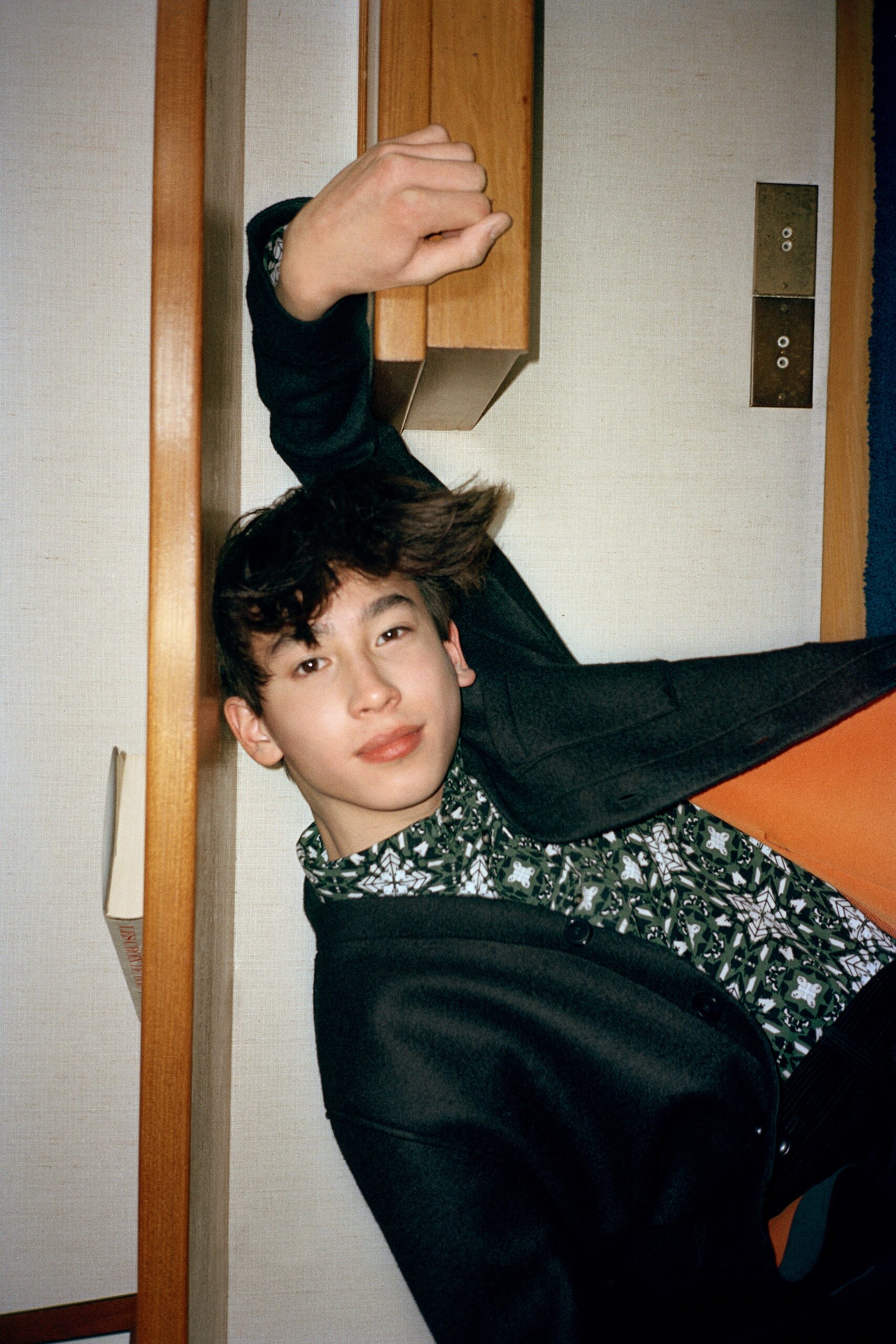 black relaxed jacket with green printed shirt