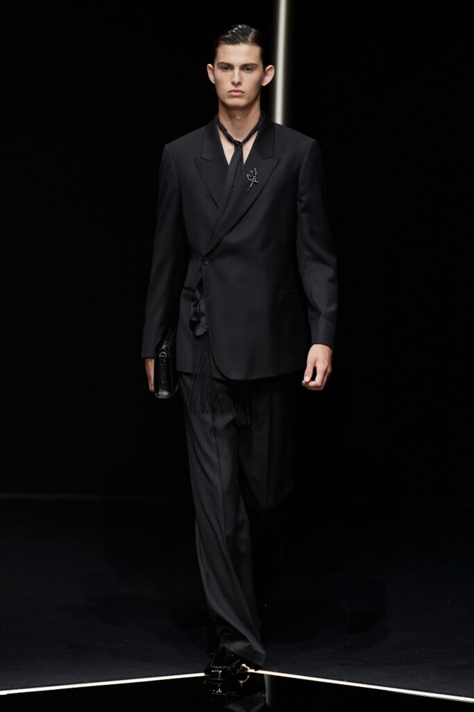 black tailored suit with bag