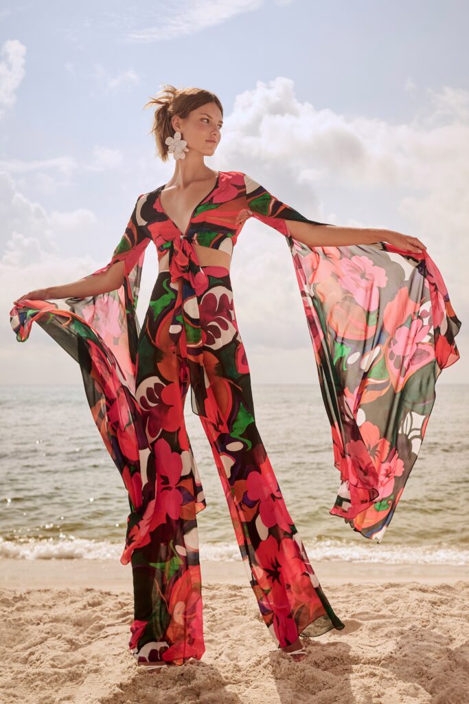 A relaxed multicolor chiffon jumpsuit with a V-neckline and flared sleeves.