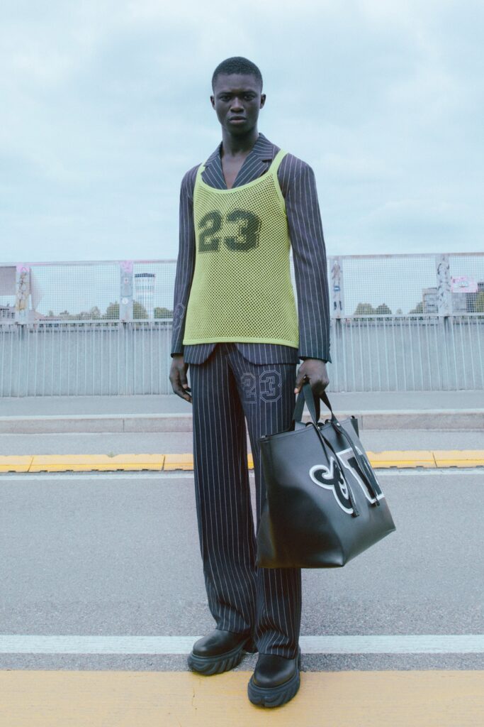 green mesh vest with tailored suit