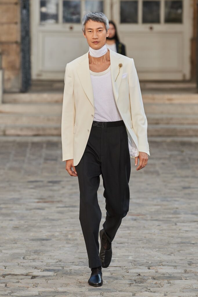 white tailored blazer with black pants