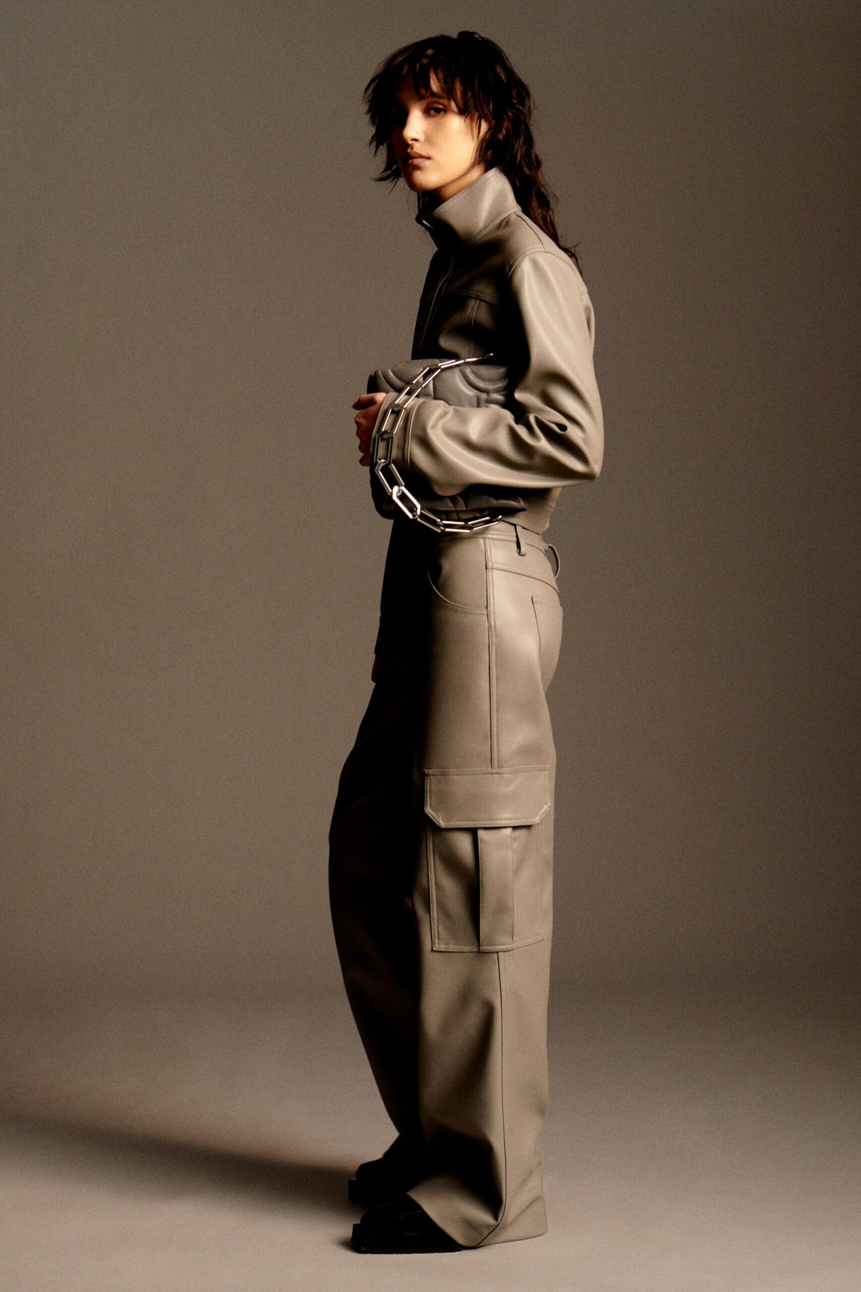 gray leather fitted jacket and relaxed pants