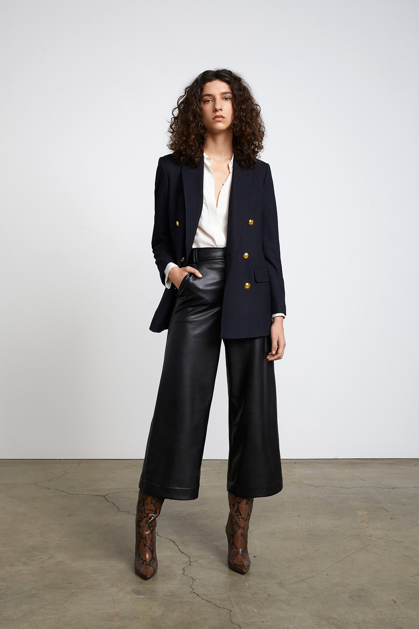 black tailored blazer with leather pants