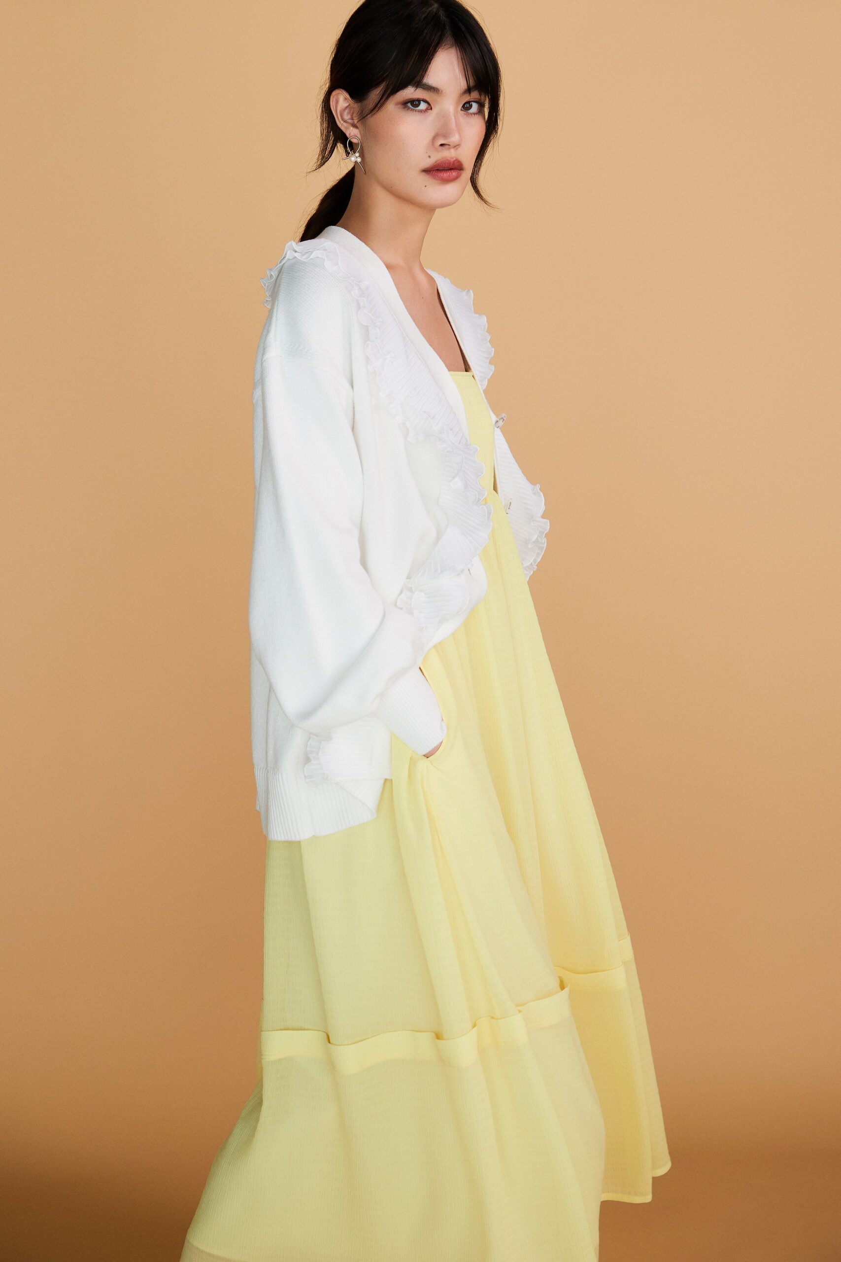 white cotton long-sleeve collared oversized ruffled cardigan