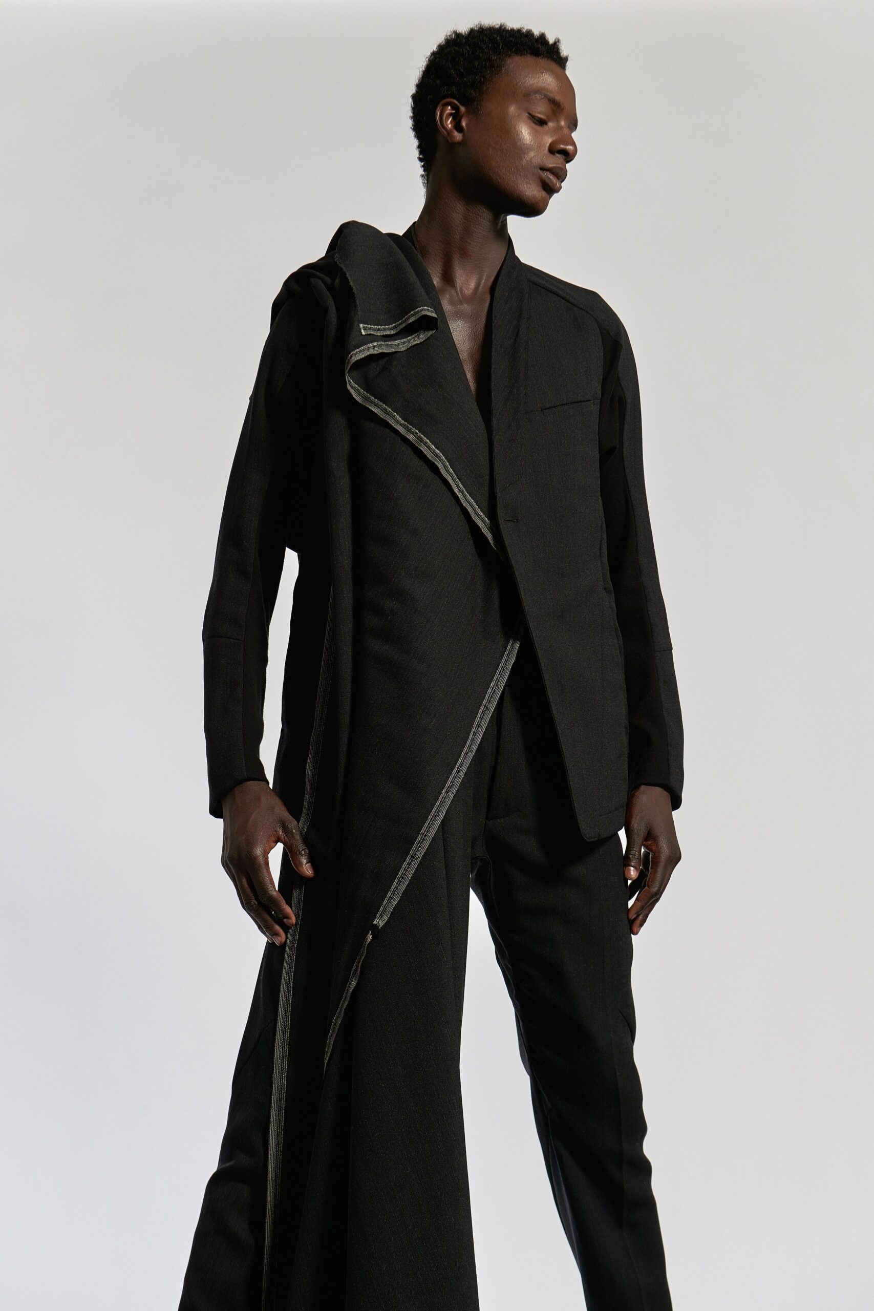 black tailored jacket and fitted pants