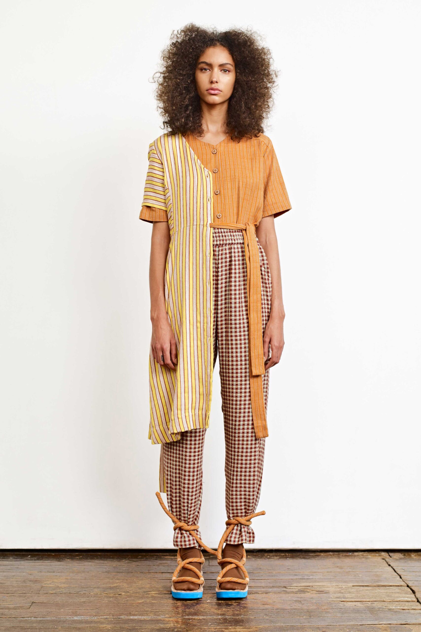 striped midi dress with checked pants