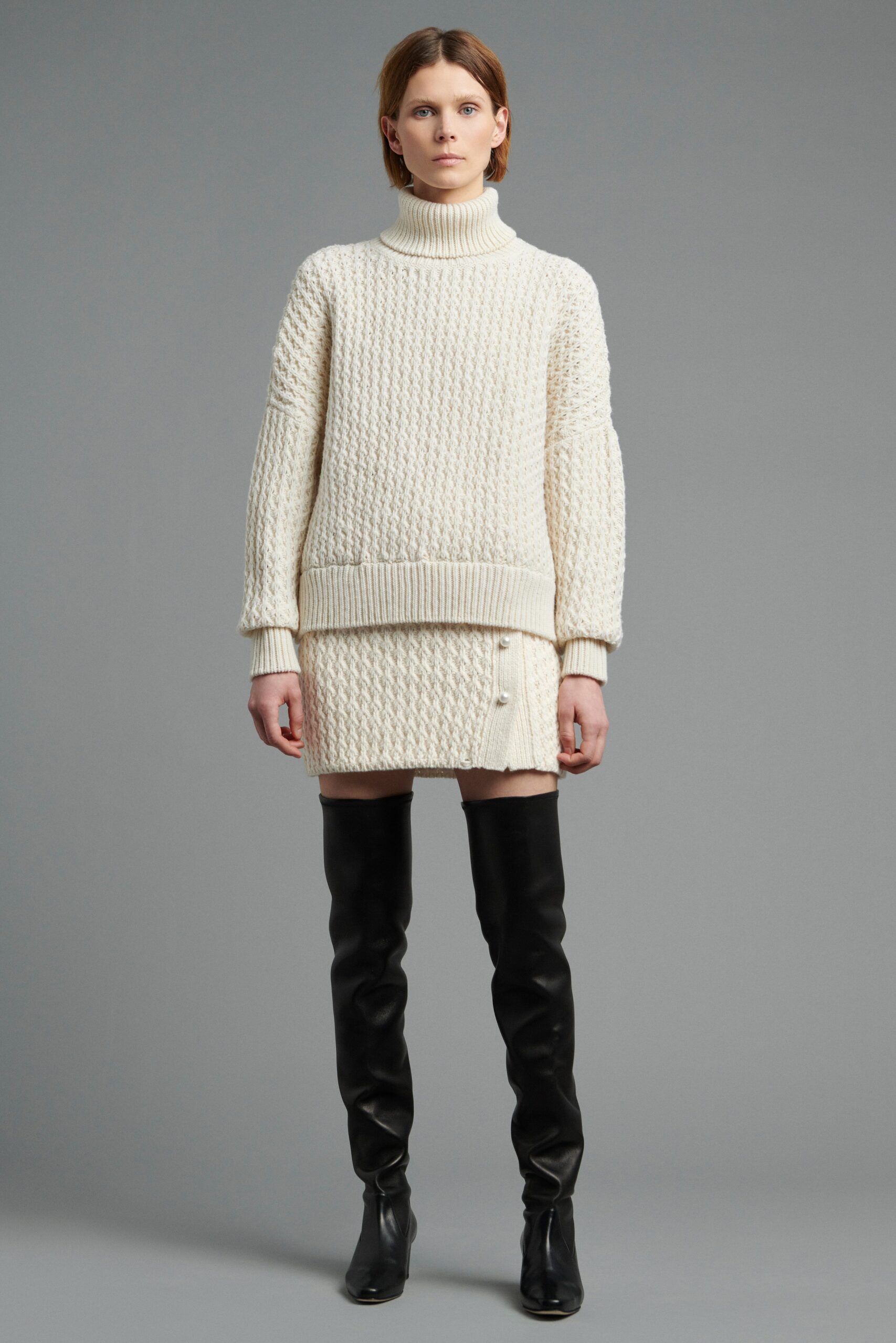 white wool long-sleeve turtleneck relaxed textured cropped sweater