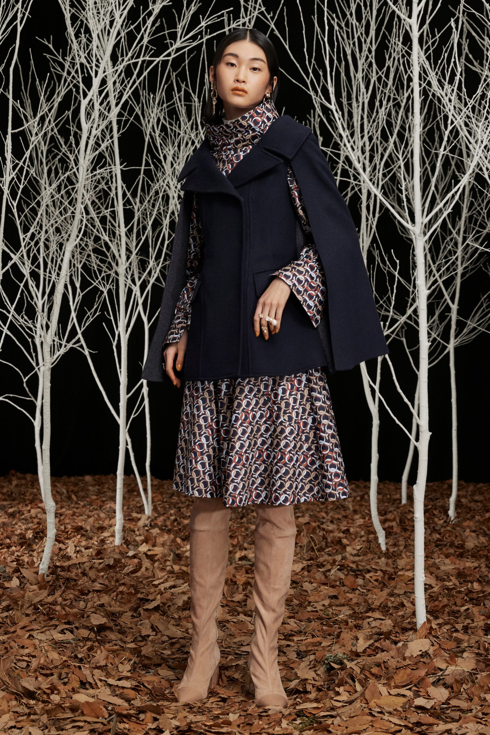 navy cape and multi printed dress