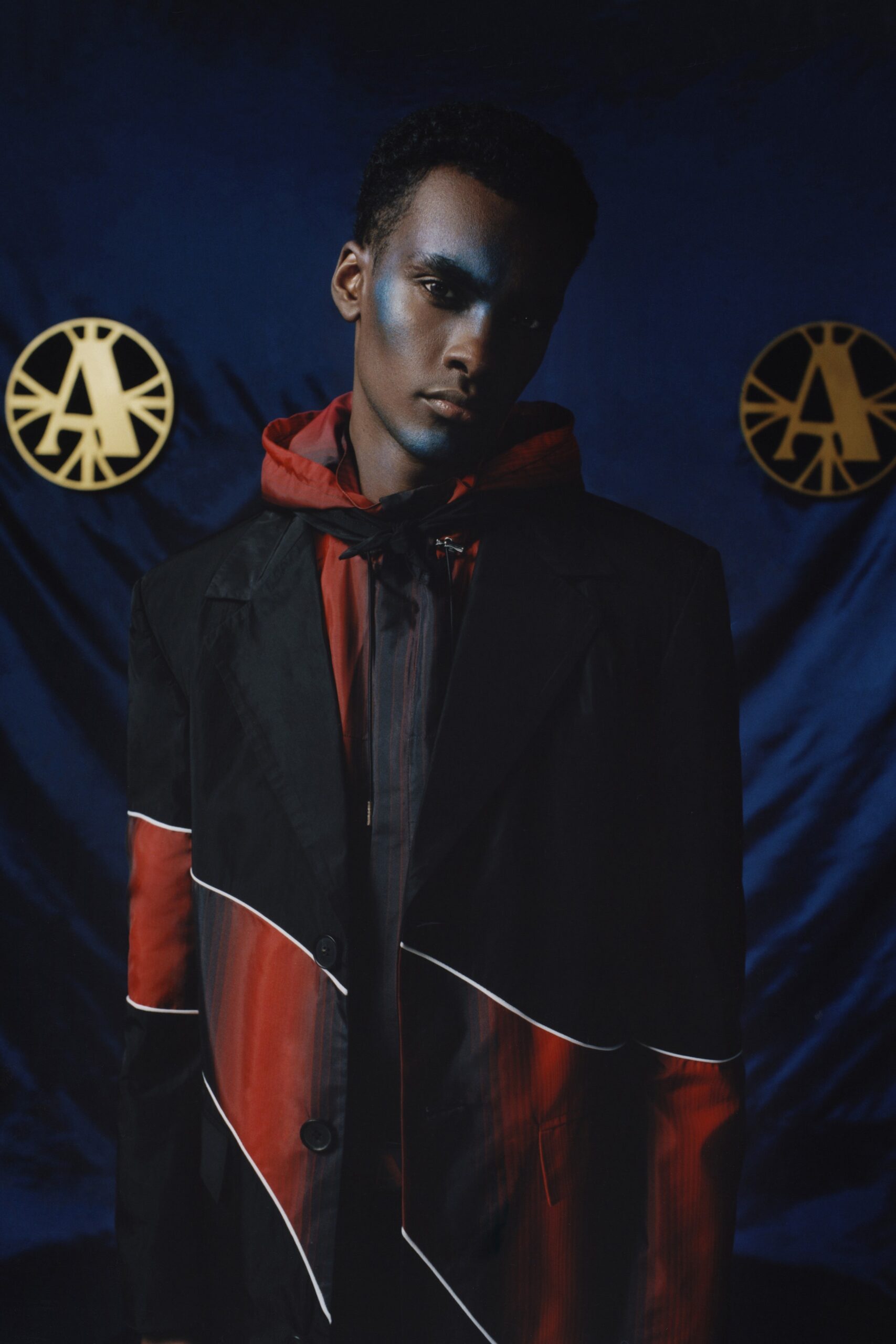 black and red color-blocked jacket with hoodie