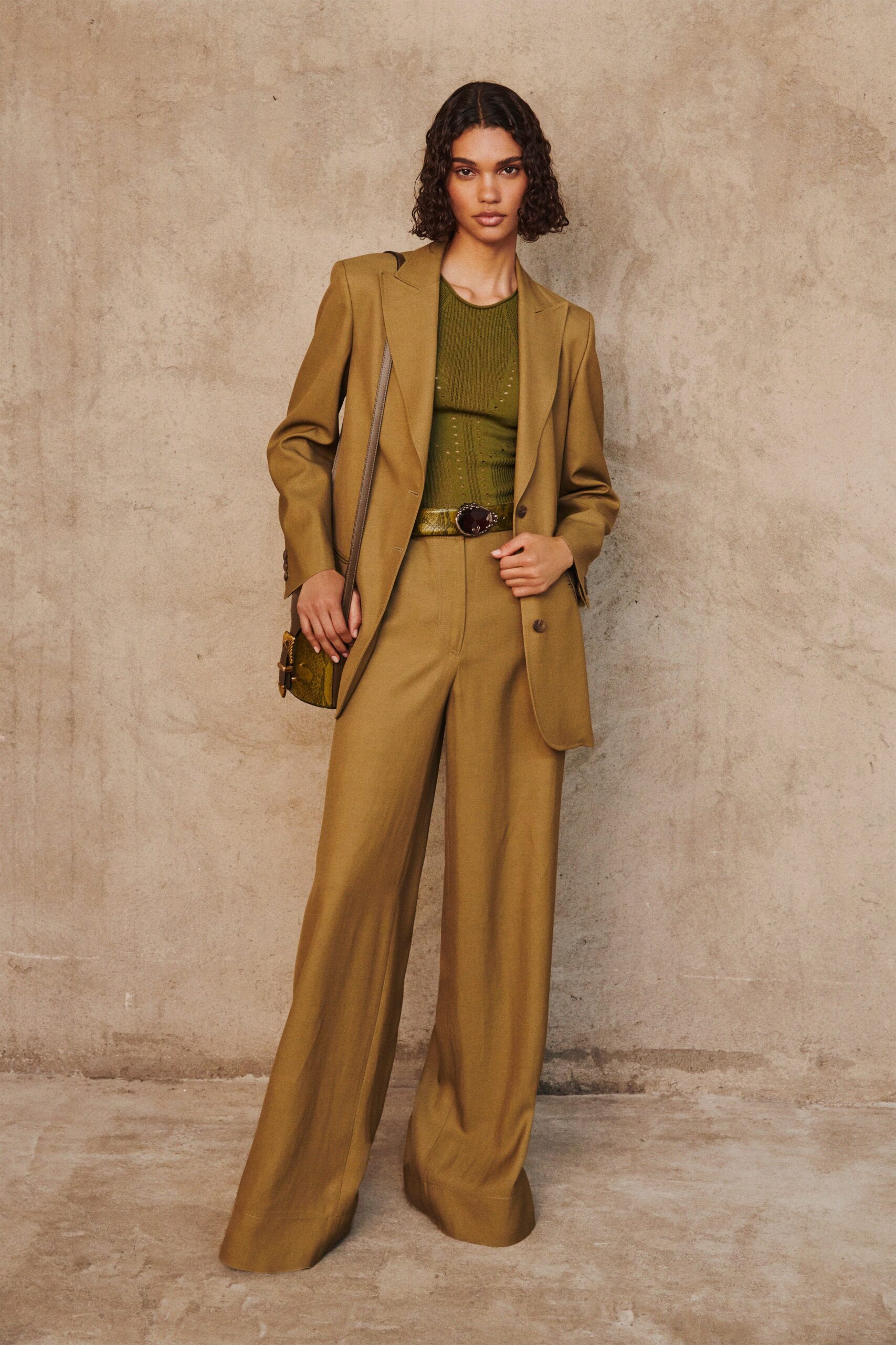 brown tailored blazer with green top
